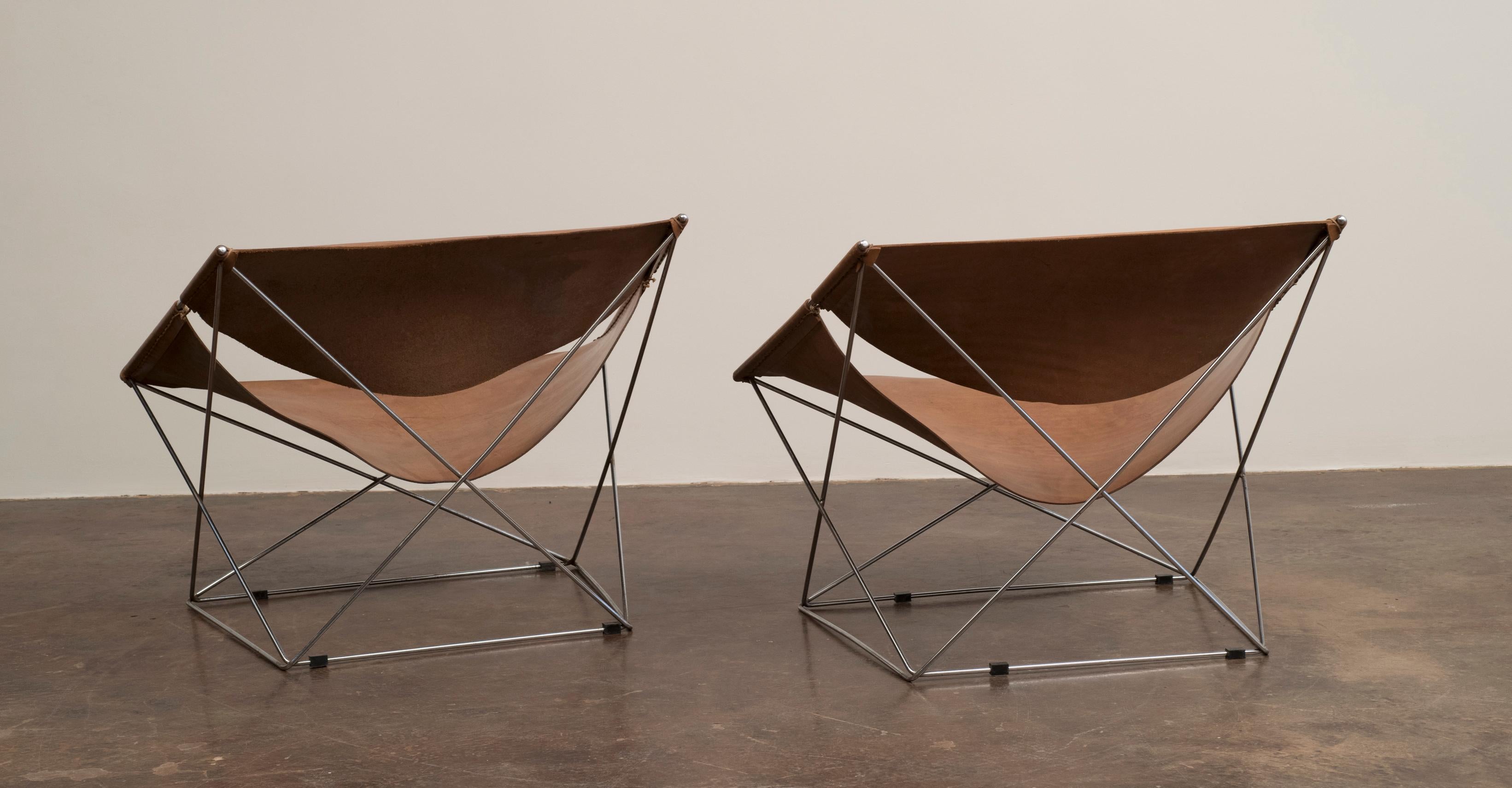 A handsome pair of Pierre Paulin Butterfly chairs for Artifort, model F675, in original cognac leather with lovely patina.