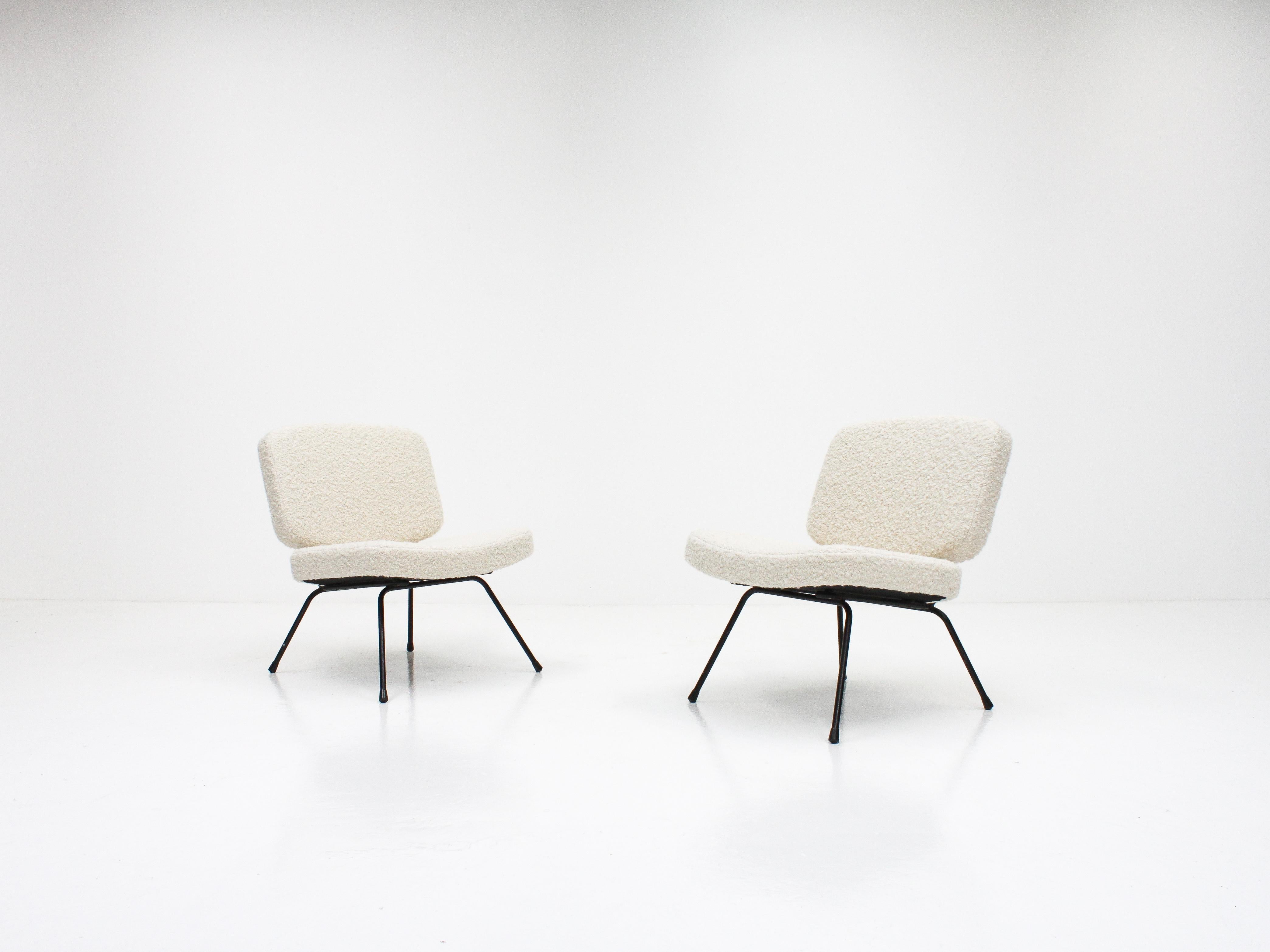 A pair of Pierre Paulin CM 190 lounge chairs, newly upholstered in soft heavy loop wool, mohair and alpaca fabric which is produced by one of the most luxurious fabric manufacturers in the world, Pierre Frey.

Manufactured in the 1950s by