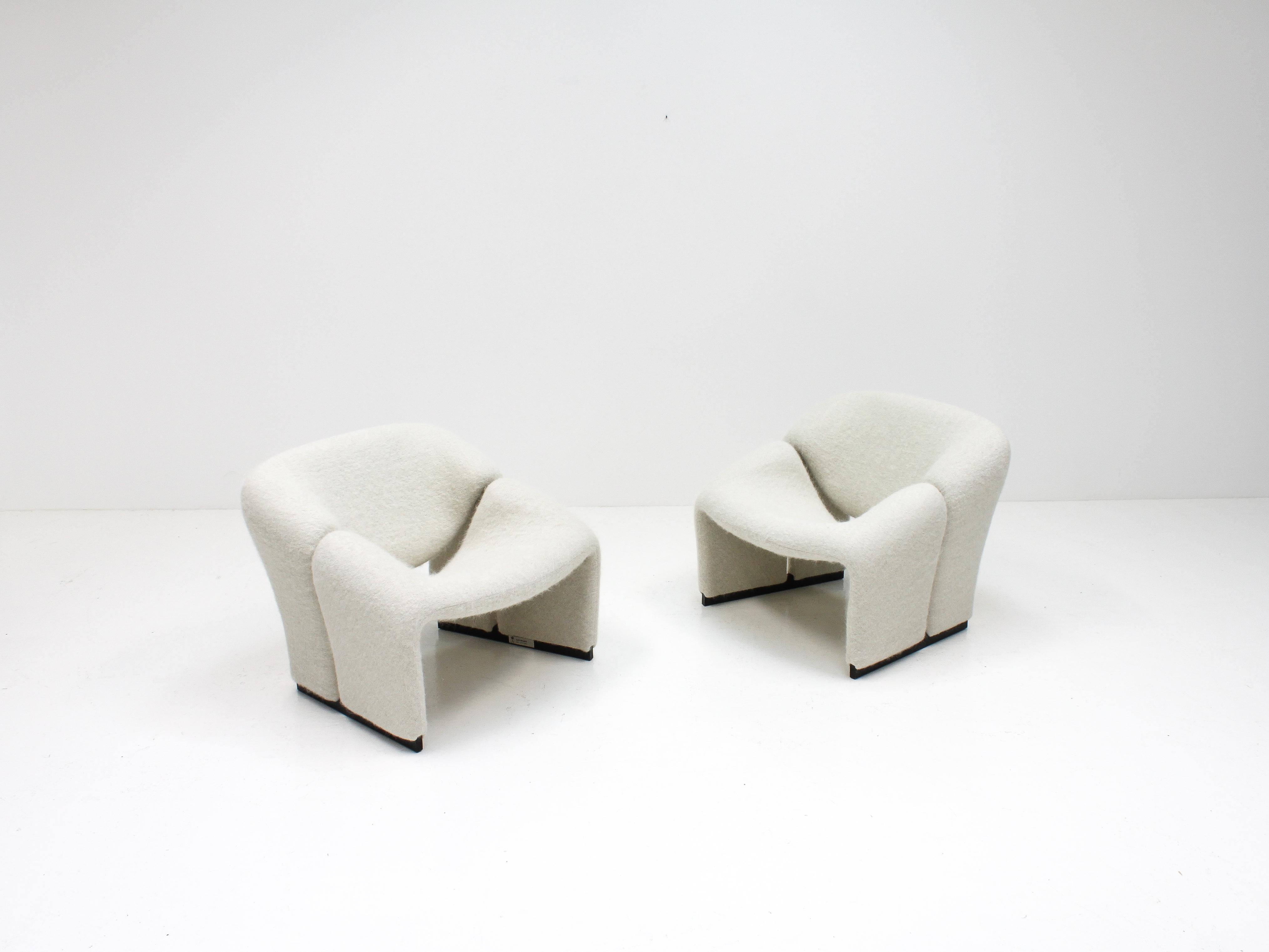 A pair of Pierre Paulin 'F580' lounge chairs for Artifort, the precursor to the Groovy chair, newly upholstered in fluffy wool, mohair and alpaca fabric which is produced by one of the most luxurious fabric manufacturers in the world, Pierre