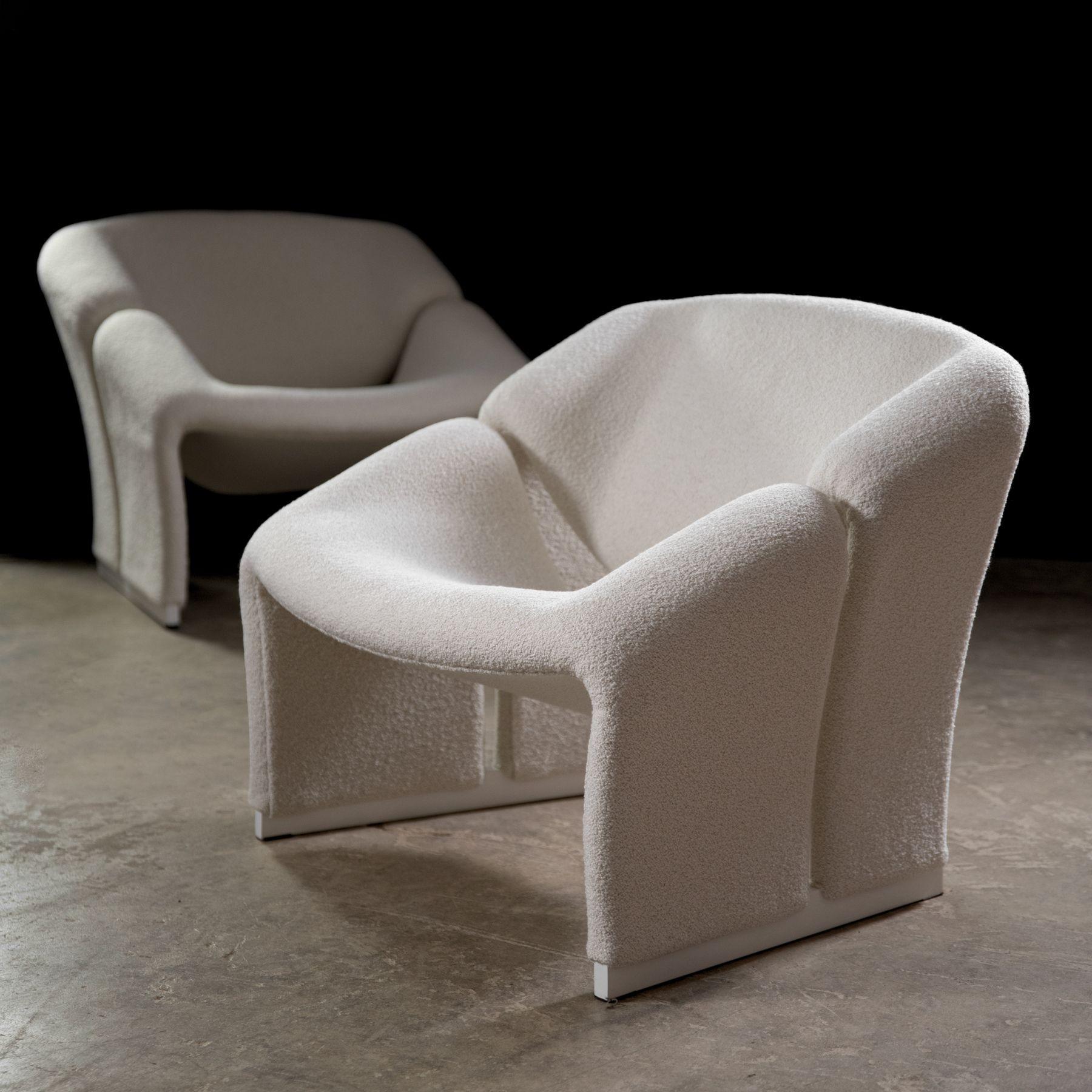 Pair of first edition Pierre Paulin F580 chairs in a soft white Italian Boucle. Fully restored with new foam and new fabric. Our upholstery team approaches these chairs like a master tailor. They are exceptionally well restored and will undoubtedly
