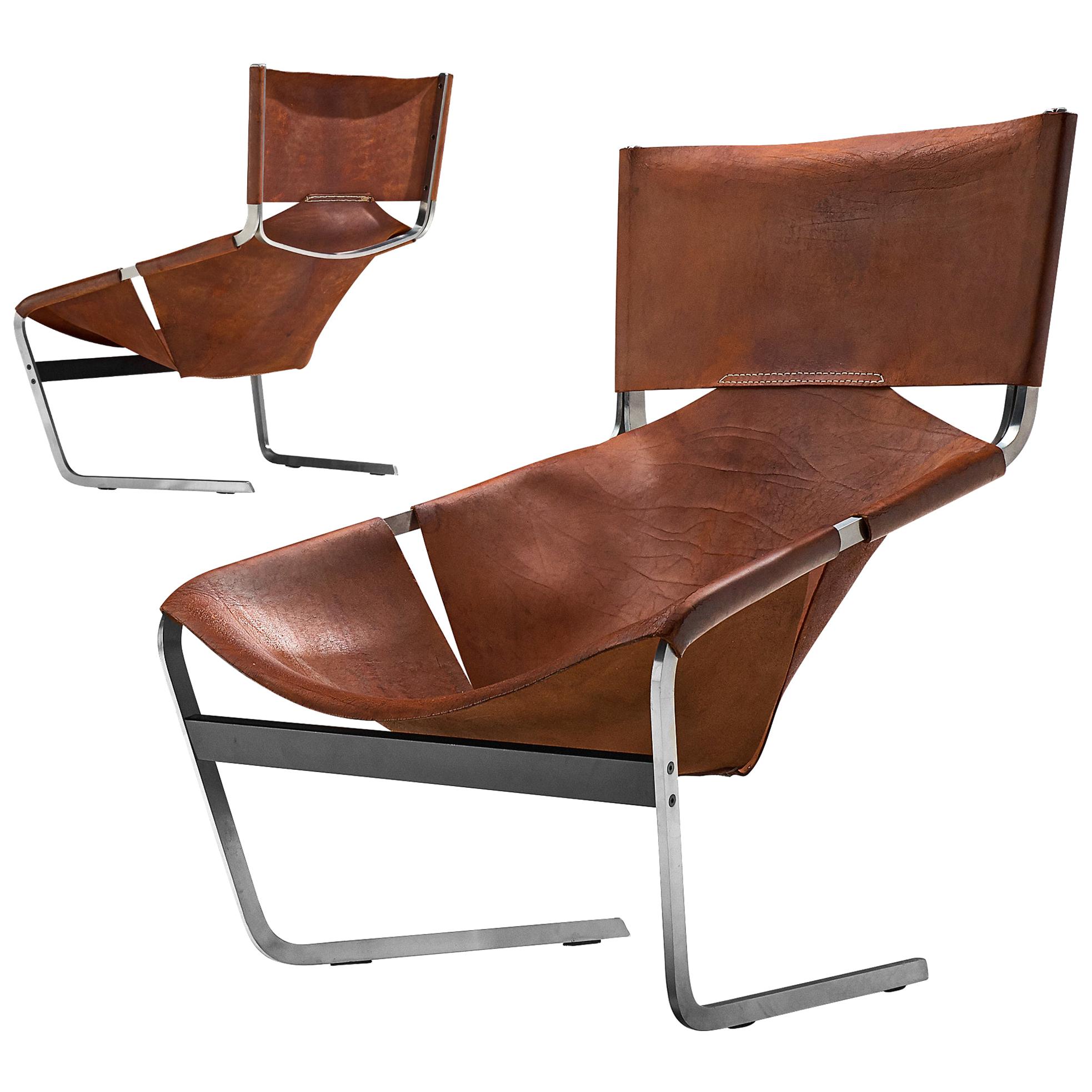 Pair of Pierre Paulin's F-444 Easy Chair in Patinated Cognac Leather