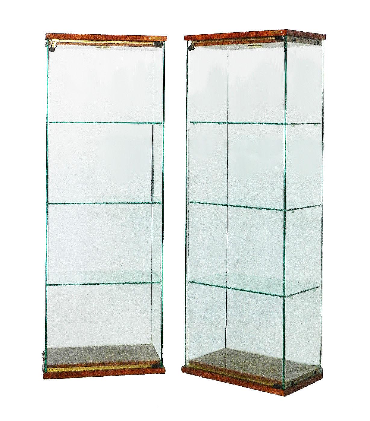Pair of Pierre Vandel Vitrines French midcentury, circa 1970
Illuminated showcase cabinets
Original labels Pierre Vandel Paris
Each has an internal top light
Doors with locks and key
Glass shelves
High shine burr walnut top and base
Very good