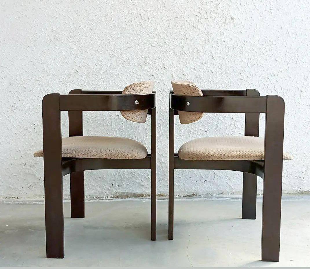 Pair of pigreco chairs by Tobia Scarpa for Gavina. 1959

This iconic beauty was designed by Tobia for it's final university exam on Franco Albini's class.

No holes in the fabric and wood in good vintage condition.
 