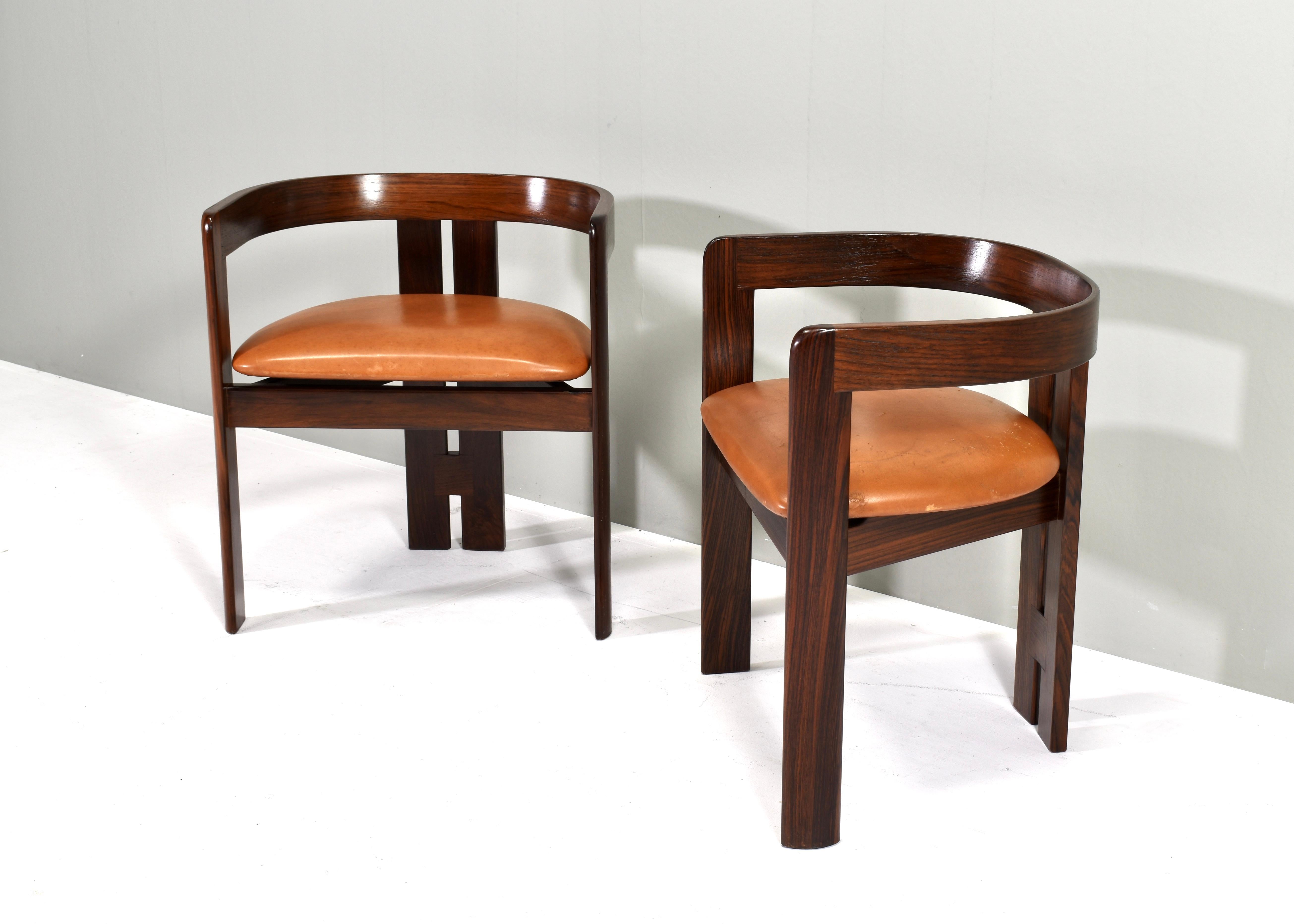 Elegant pair of Pigreco chairs by Afra & Tobia Scarpa for Gavina, Italy – circa 1970.
The chairs are still upholstered in the original tan leather. The condition of the wood is excellent. The leather is good / fair. Both leather seats have signs of