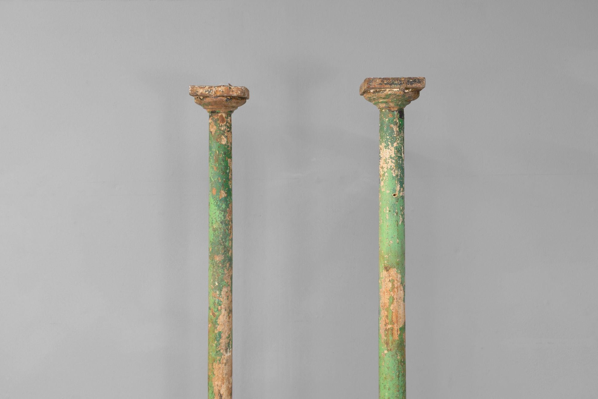 Pair of cast iron support pillars in aged green paint.
U.K circa 1880.
H 198cm x W 13cm x D 13cm
Please be in touch for an accurate shipping quote.