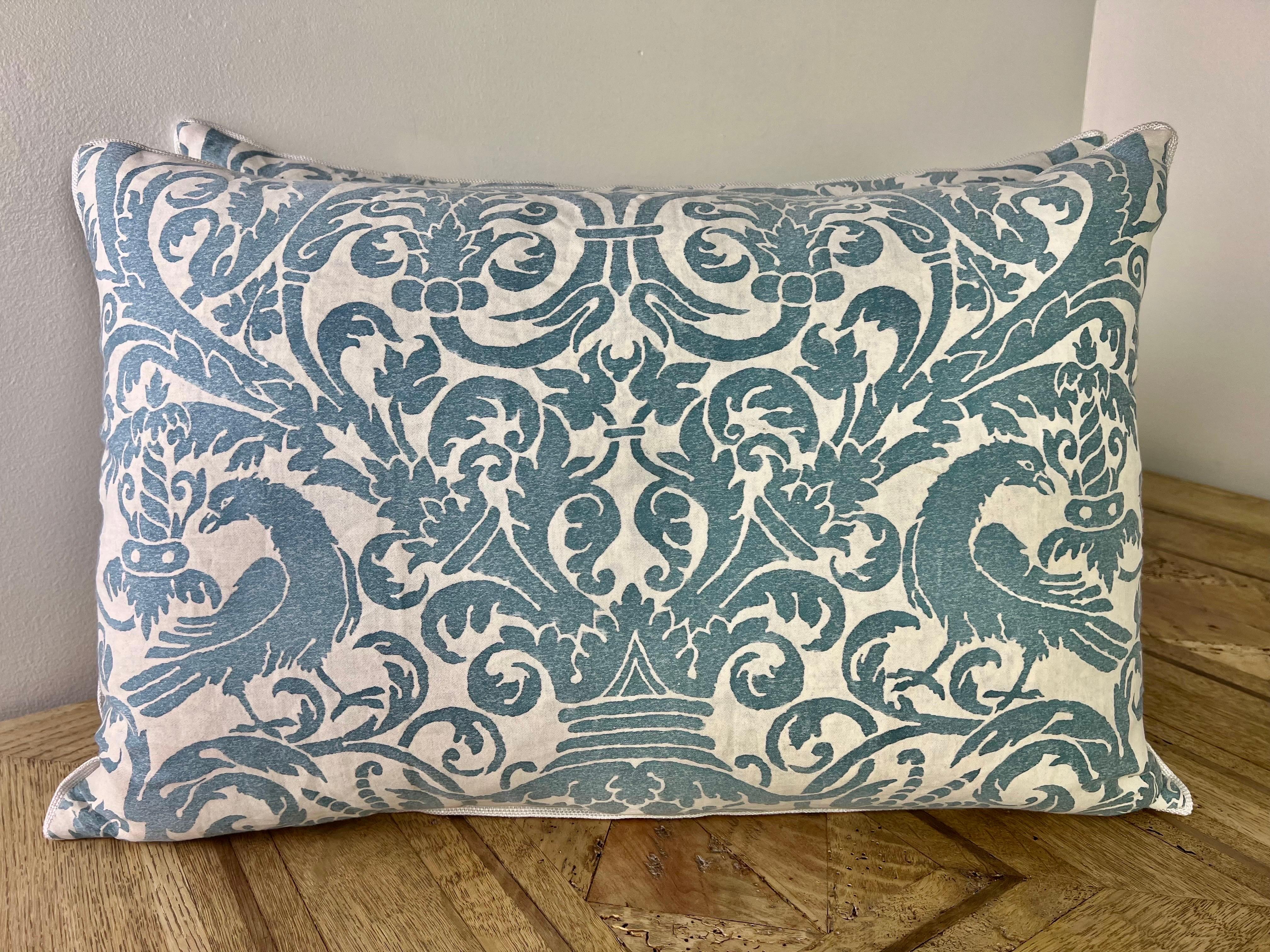 Custom pillows made using vintage blue & white Fortuny Uccelli patterned fronts and white linen backs with a self welt detail. Down inserts, zipper closures.