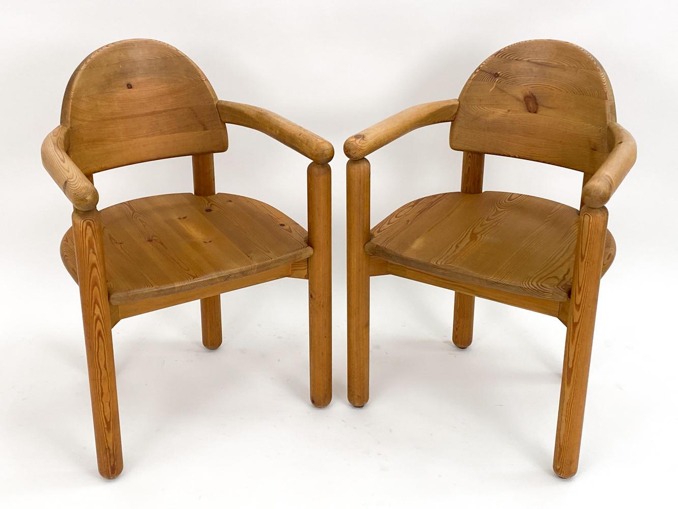 Rainer Daumiller's Pine Armchairs, crafted in Denmark circa 1980, are a harmonious blend of raw nature and refined design. Each chair feels as if it has been sculpted from the heart of a majestic pine, capturing the very essence and spirit of the