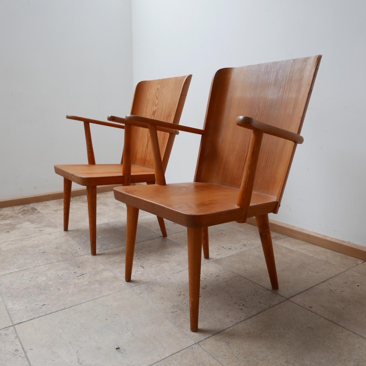 A pair of armchairs by Göran Malmvall for Svensk Fur.

Sweden, c1950s. 

Very much echoes of Axel Einer Hjorth but much more affordable.

Could easily be softened further with a thin cushion (we can have it made at cost). 

Condition is