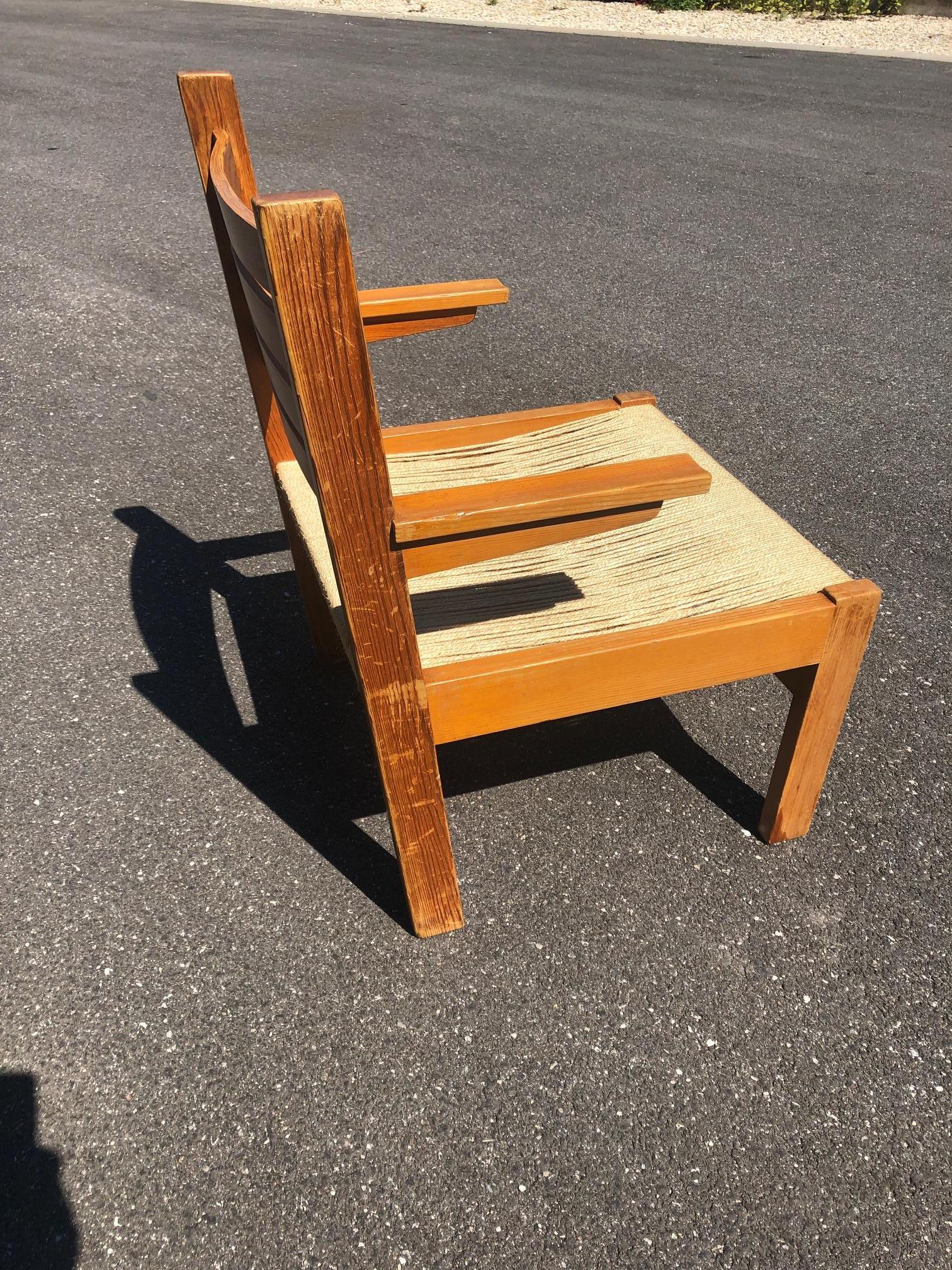 Pair of chairs with rope seat and pine frame from the 1960s.