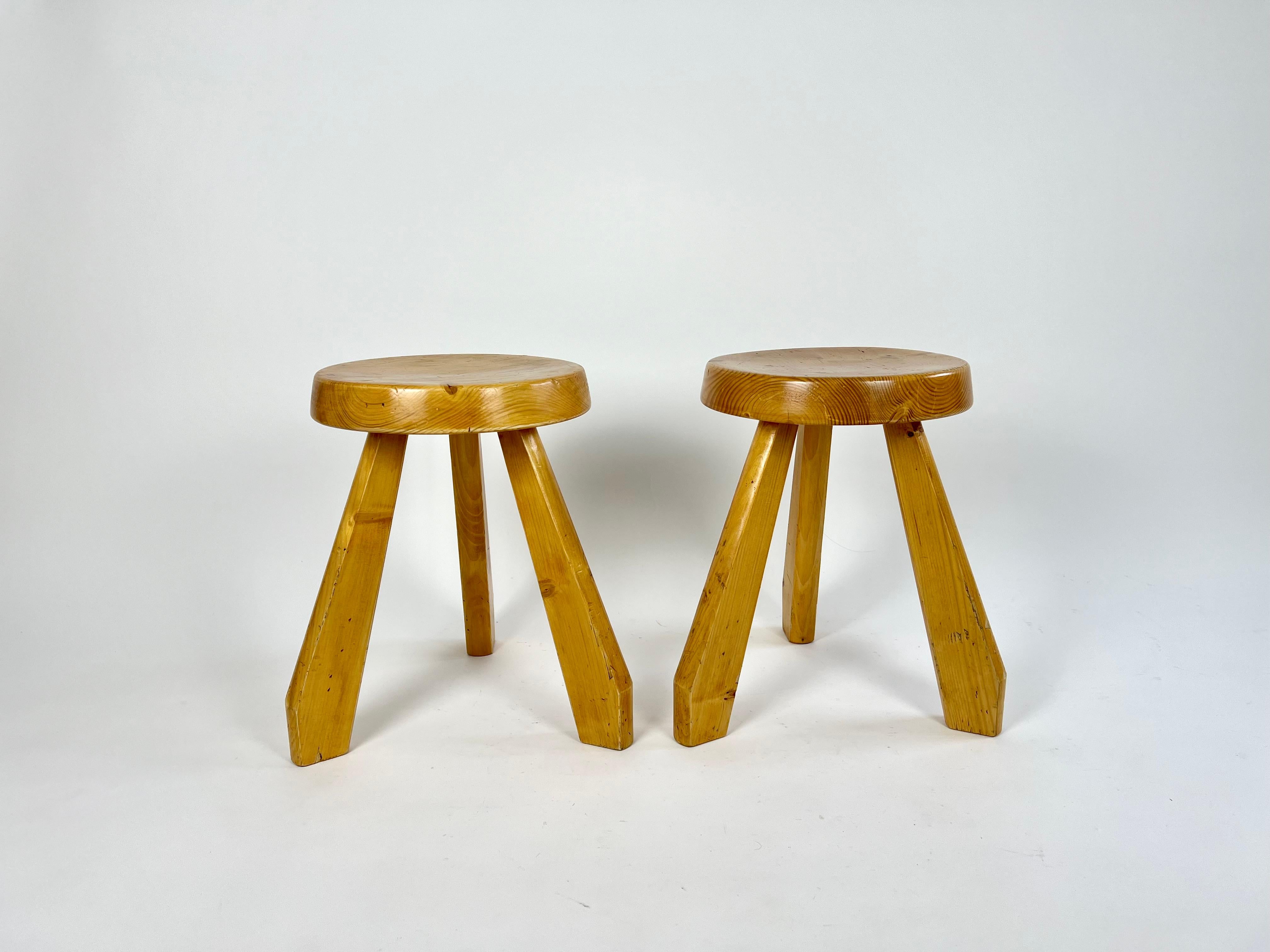 Pair of pine stools by Charlotte Perriand, circa 1960 from Les Arcs, France.

The stools were sourced from a chalet clearance in the Haute Savoie region of France.

Original condition, with signs of age and use, age related wear as pictured.