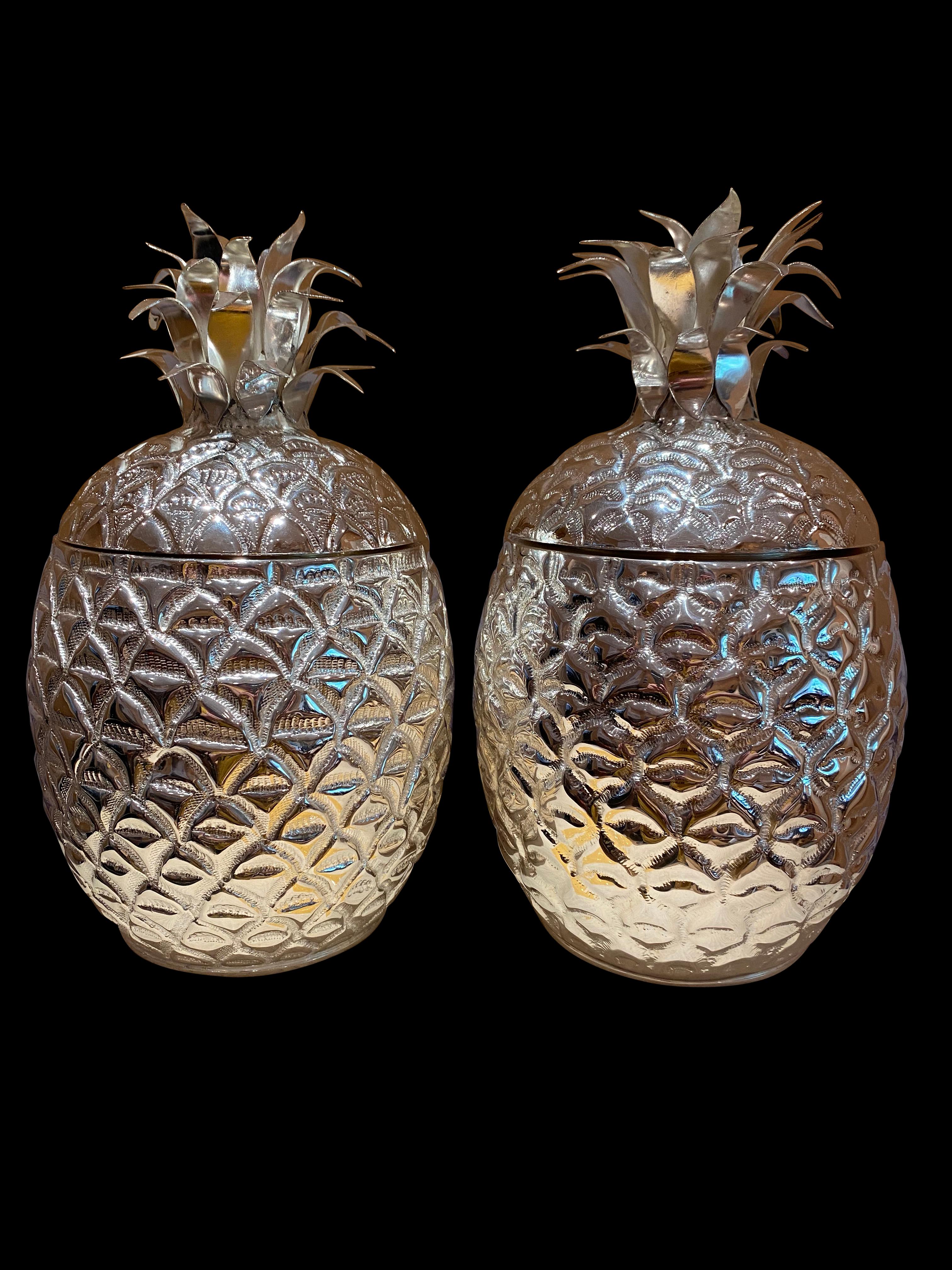 Oversized antique Indo Sarouk dense weave full pile and soft rug. It has been knotted a pair of pineapple champagne buckets, silver plate wine cooler holders, 20th century. Attention grabbing in the form of a pineapple. Great finish to silver plate.
