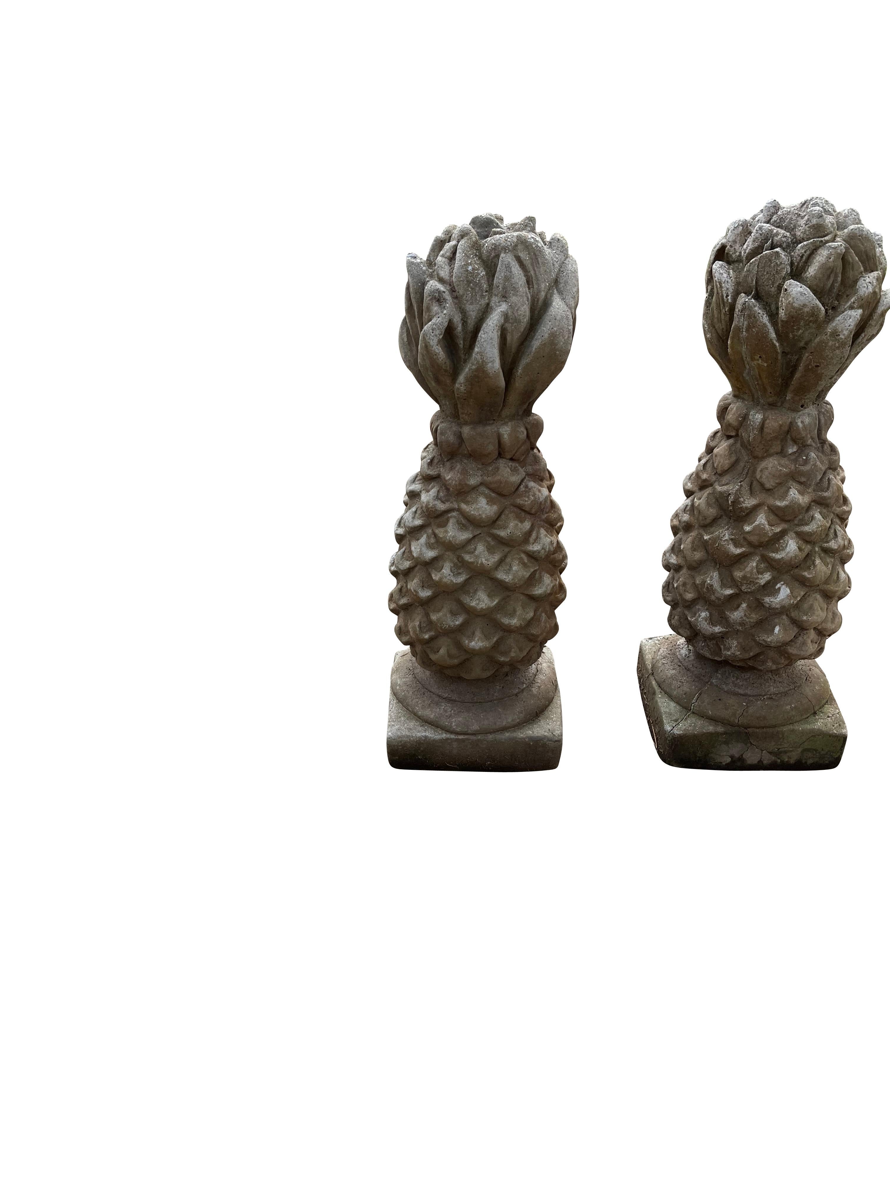 Attractive pair of cement pineapple garden finials. Perfect for a welcoming entryway, in a garden, or doorway.
