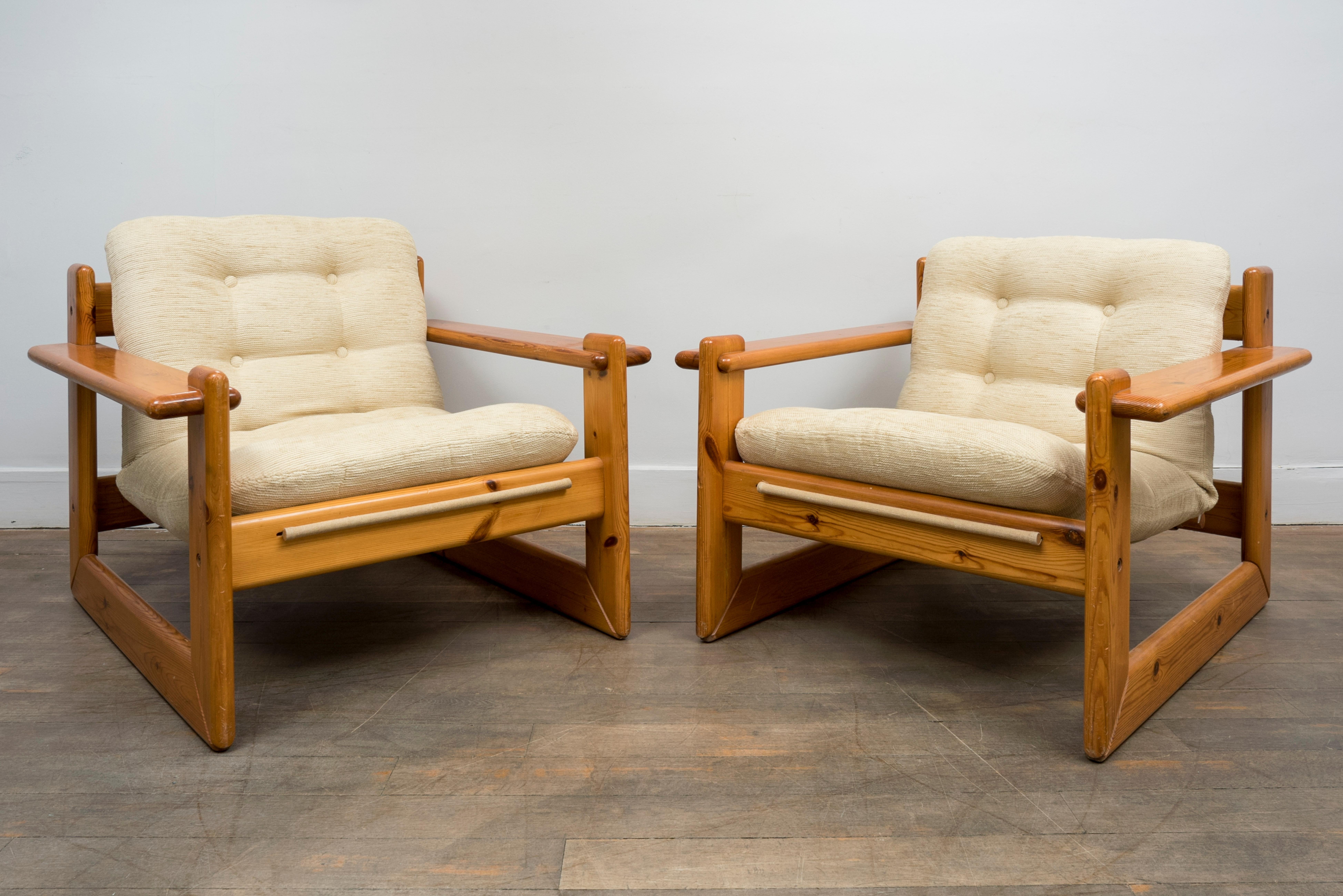 Pair of lounge chairs
Varnished pinewood
Original fabric in very good condition
France, 1960s

Measures: Height 26.4 in. (67 cm)
Width 32.6 in. (83 cm)
Depth 32.6 in. (83 cm)
Height seat 15.3 in. (39 cm).
 
