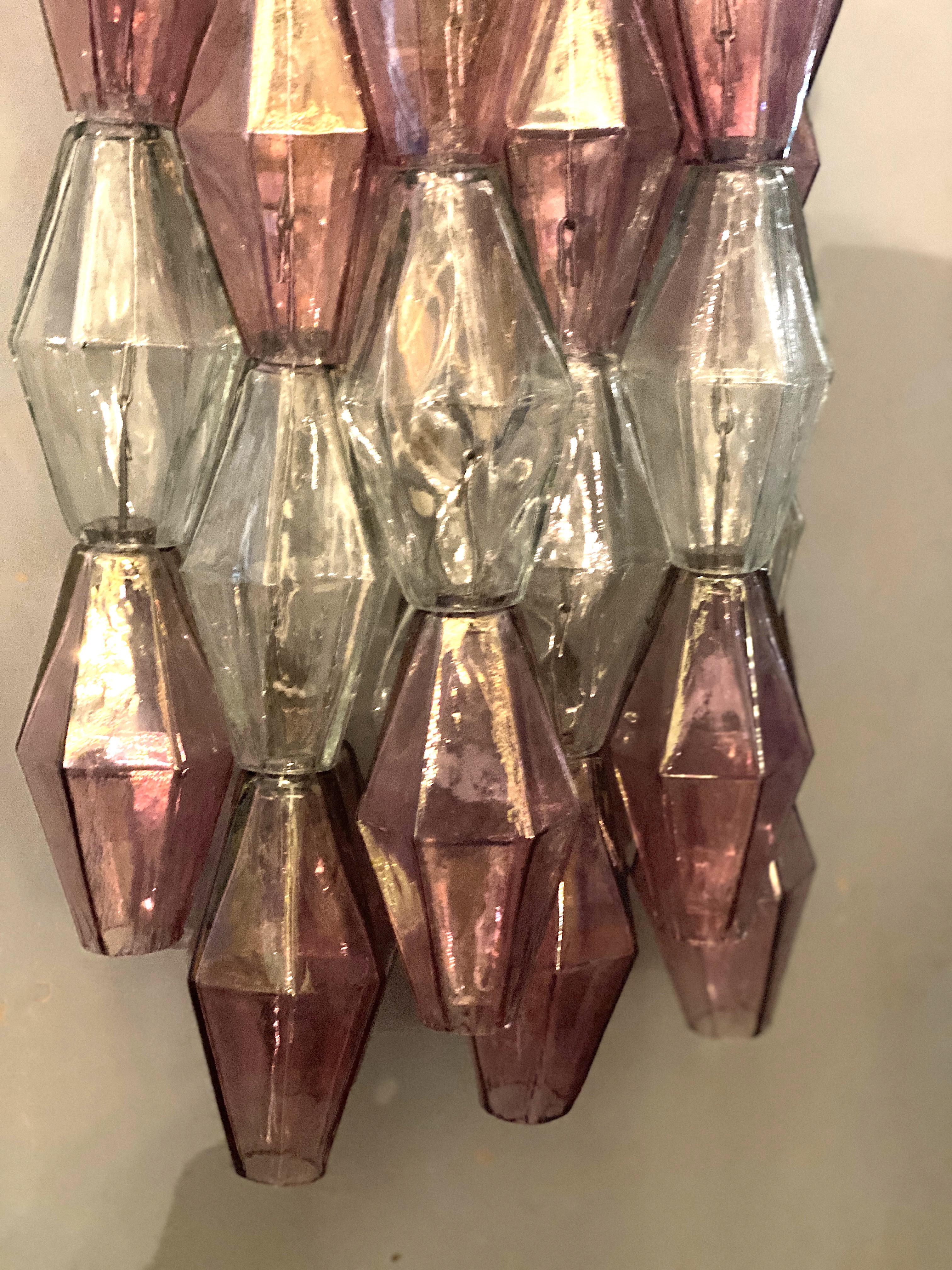Amazing pair of poliedri wall lights. Rare combination of iridescent pink amethyst  and clear color Murano glass.
Available four pairs and also a chandelier.
Provenance form a historic Roman Palace of the period.
 
Cleaned and re-wired, in full