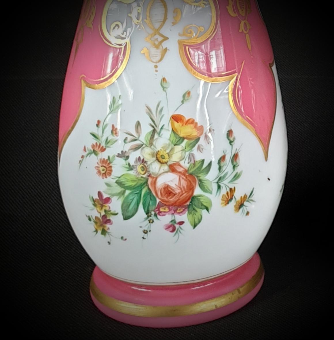 Hand-Carved Pair of Pink and White Opaline Glass Urns Gilded and Painted with Flowers For Sale