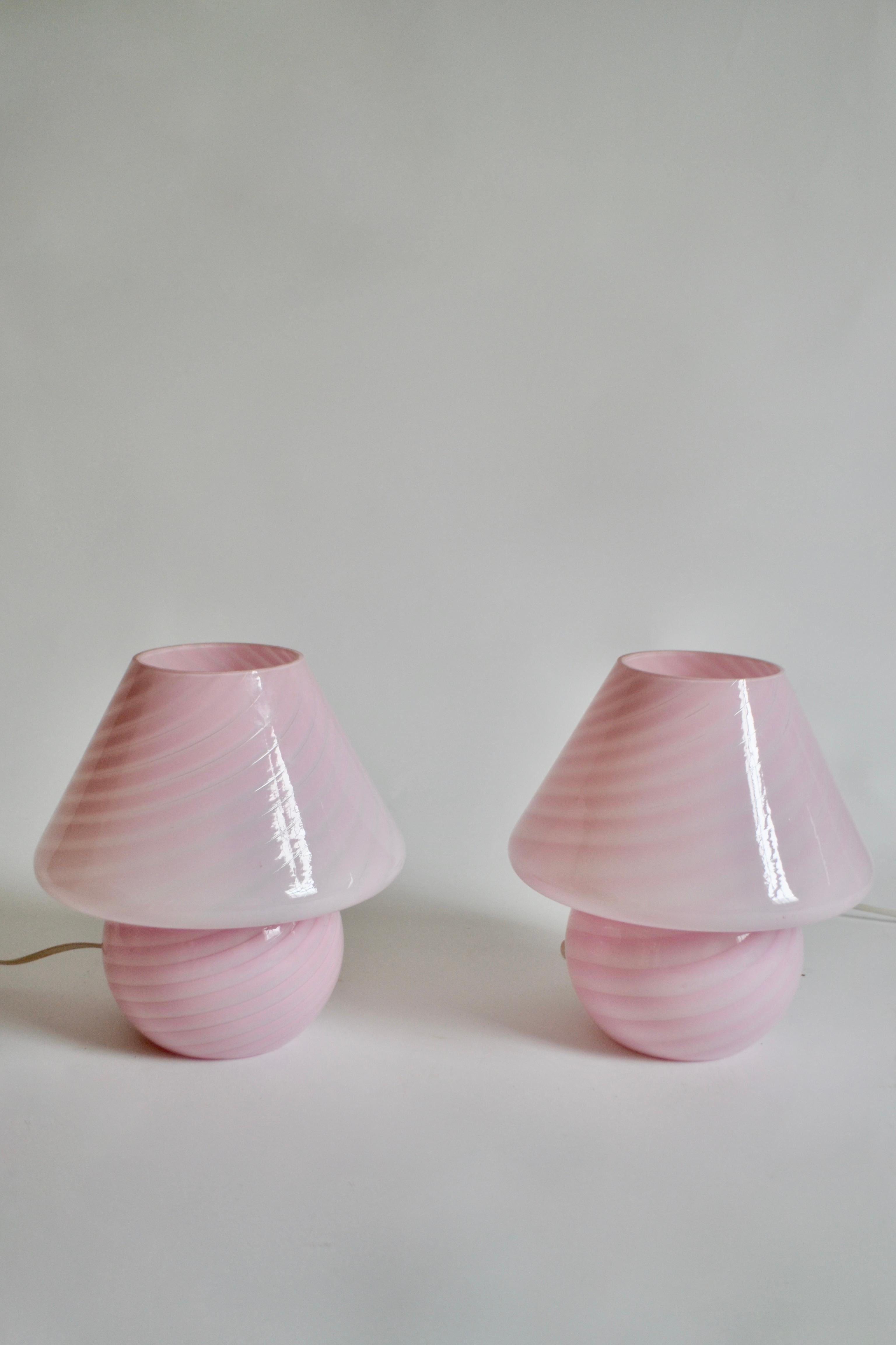 Pair of iconic Italian Murano Vetri swirl pink mushroom table lamps from the 1970s. Good condition. UK plug.