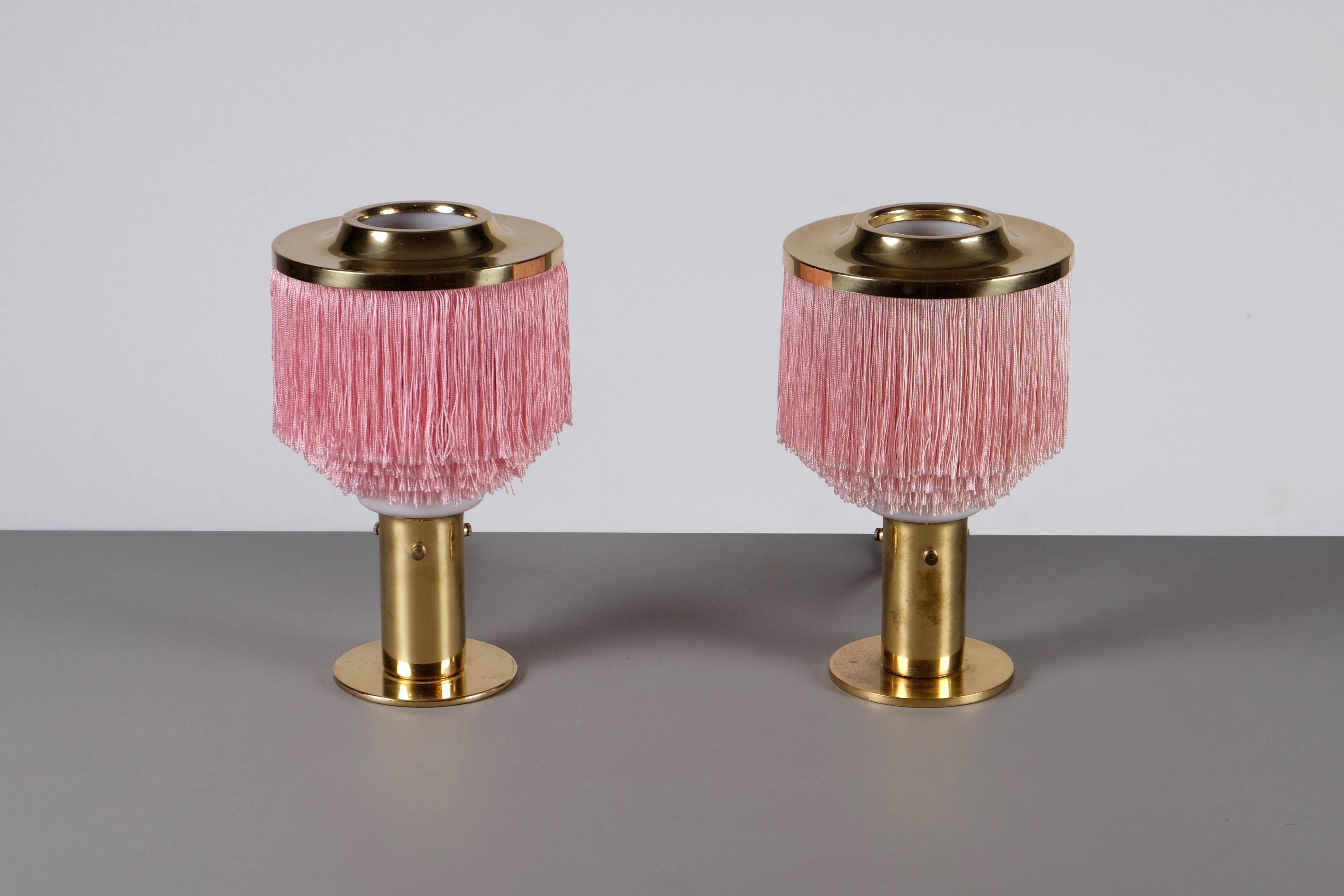 Pink fringes, brass and opaline glass shades. Produced by Hans-Agne Jakobsson, Markaryd, 1960s.