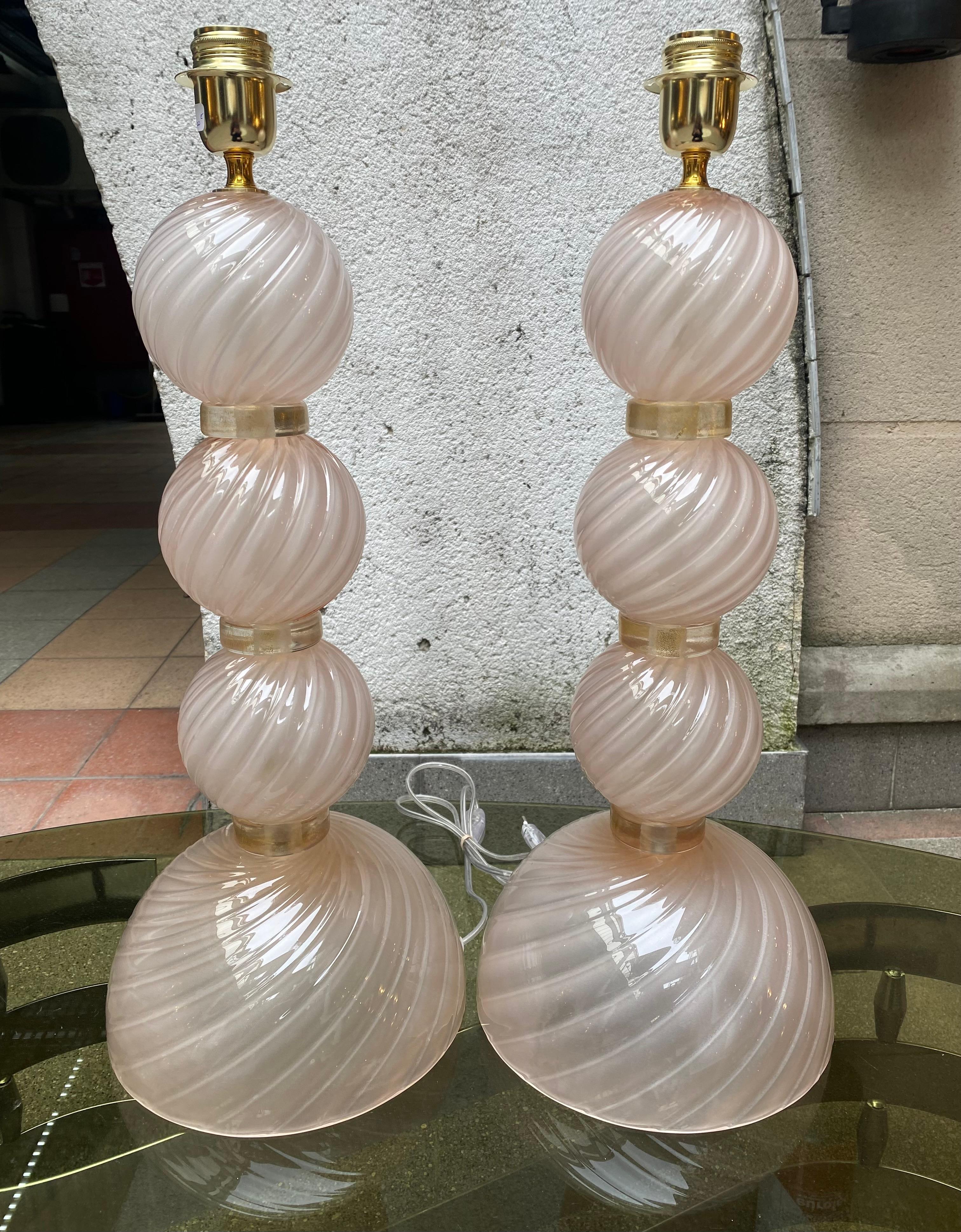 Pair of pink lamps 
Murano glass 
Dimensions : h60xl25cm
Ref : c/1938/2
Price : 3200€ for the pair.