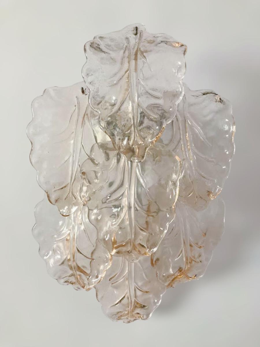 Italian wall light with layered pink Murano glass leaves / Made in Italy in the style of Mazzega, circa 1960s
Measures: Height 21.6 inches, width 14 inches, depth 7 inches
2 lights / E12 or E14 type / max 40W
1 pair available in stock in Italy
Order