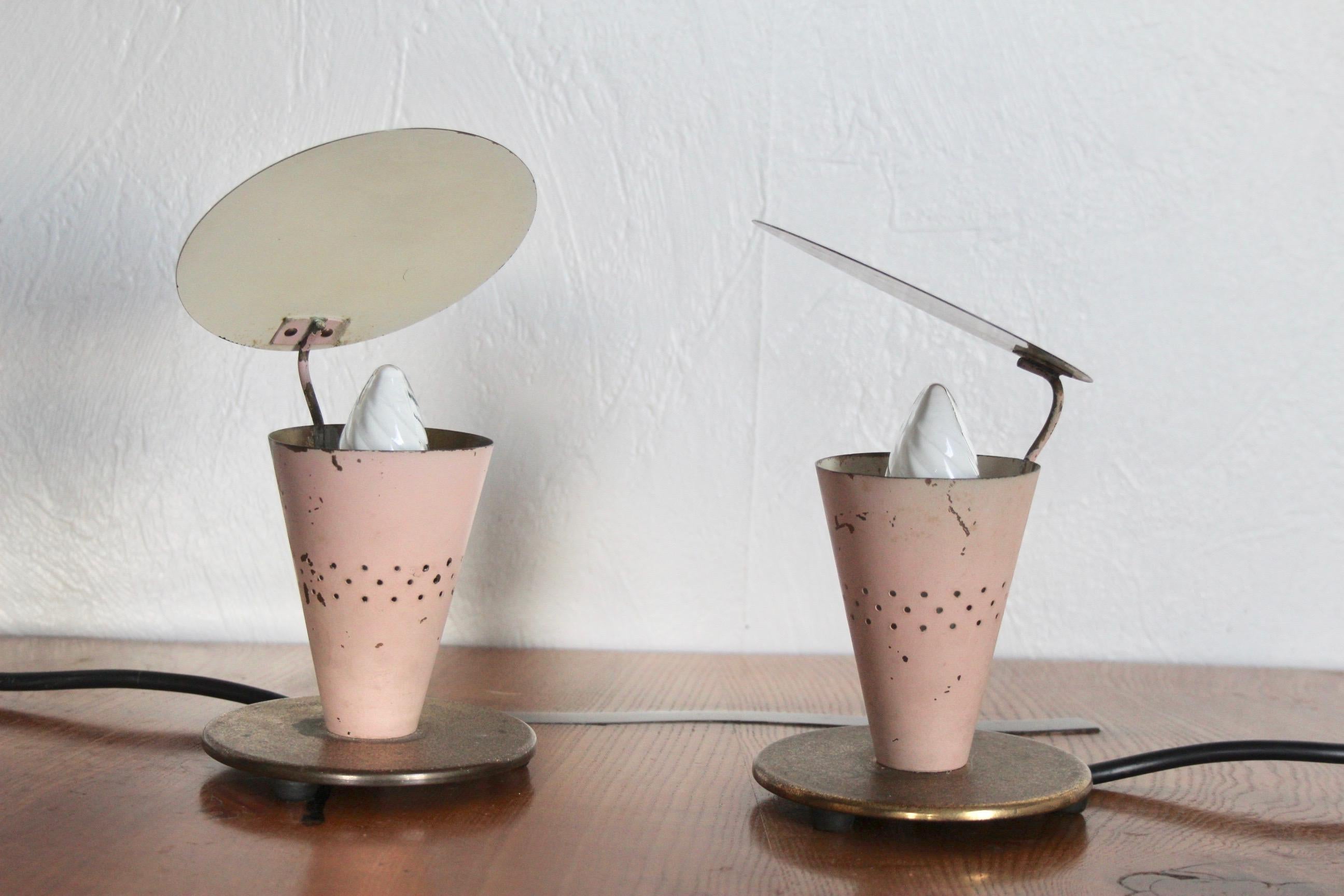 Pair of pink metal table lamp, the electric cables have been changed and the paint is damaged.