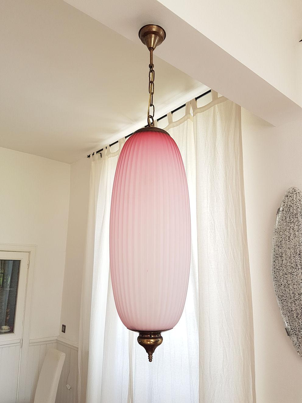 Large pair of Mid-Century Modern pink Murano glass and brass lanterns or pendant lights, Caccia Dominioni style, Italy, 1960s.
Pleated pink to white translucent glass lights, with brass mounts. Beautiful quality.
1 light each, rewired for the