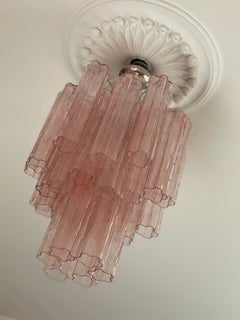 Pair of Pink Murano Chandeliers in the of style of Venini. small-medium size.