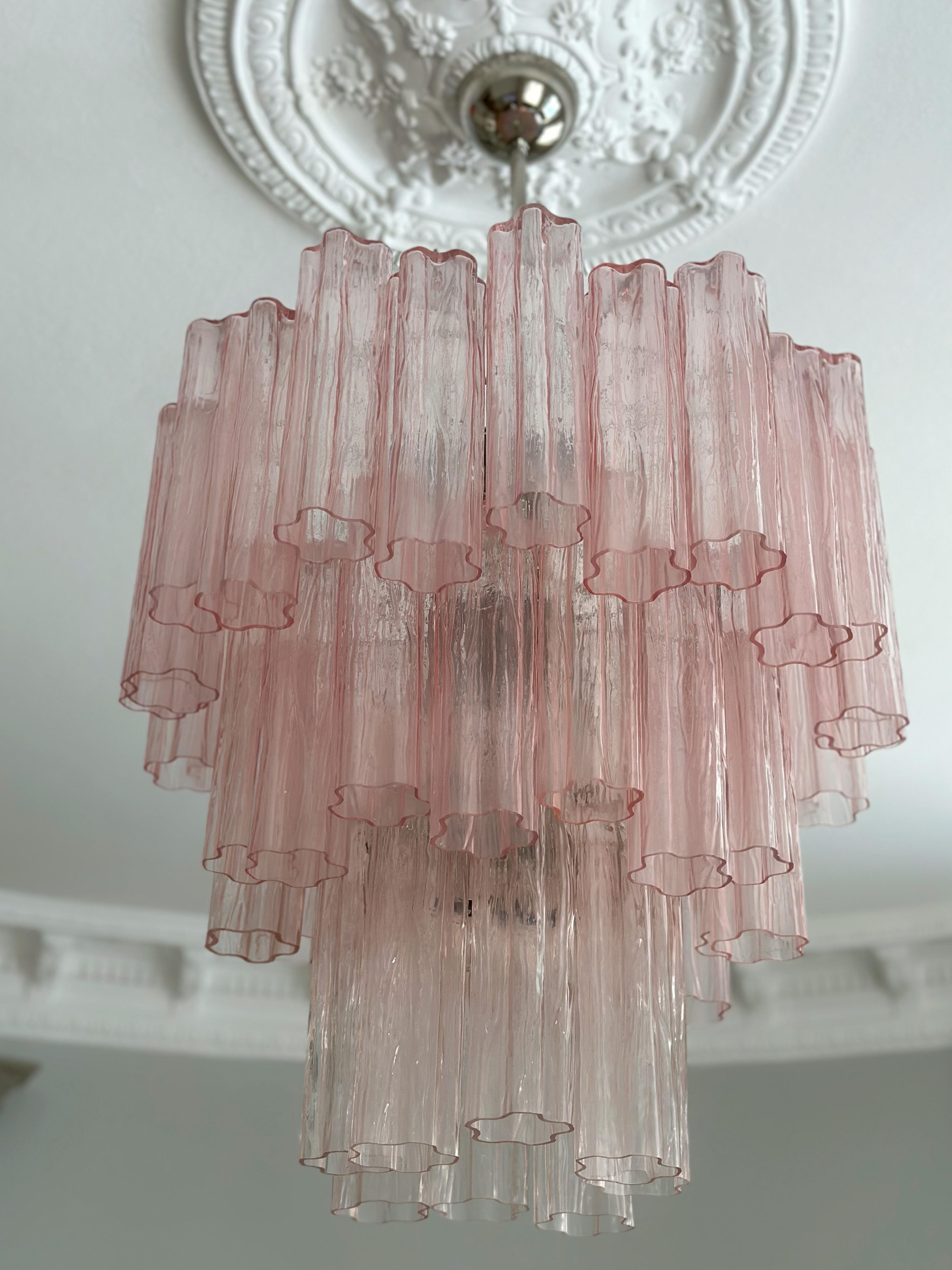 Set of two 2 Pink Contemporary Murano Chandeliers. Tubular Tronchi Formed Glass Prisms in Traditional Italian Mid-Century Style.
The murano fixtures are composed of 48 Glass Elements in the size of 25 x7 cm (9.9