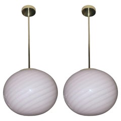 Pair of Pink Murano Glass Globe Chandeliers with Swirl Design. Italy, 1970
s.