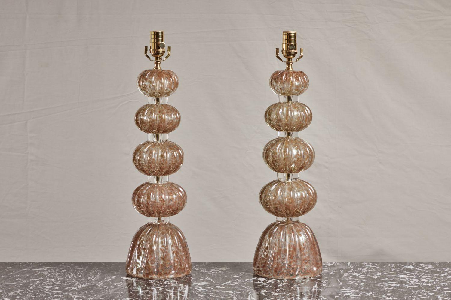 Pair of Pink Murano glass lamps with fluted stacked spheres.
