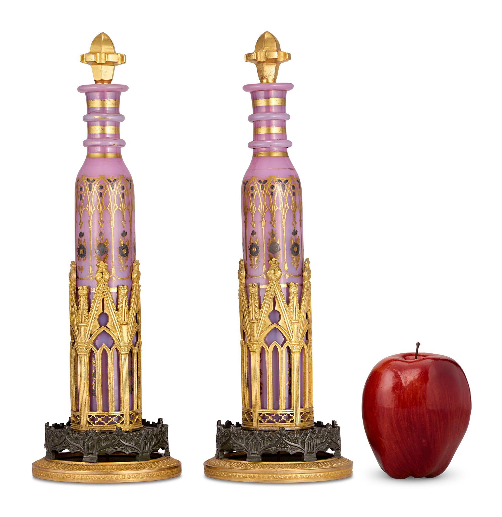 Pair of Pink Opaline Perfume Flasks
Jean Baptiste Des Vignes
Circa 1820-1830

This pair of exquisite pink opaline perfume flasks, crafted by the renowned Jean Baptiste Des Vignes during the Charles X period, exemplifies the refined artistry and