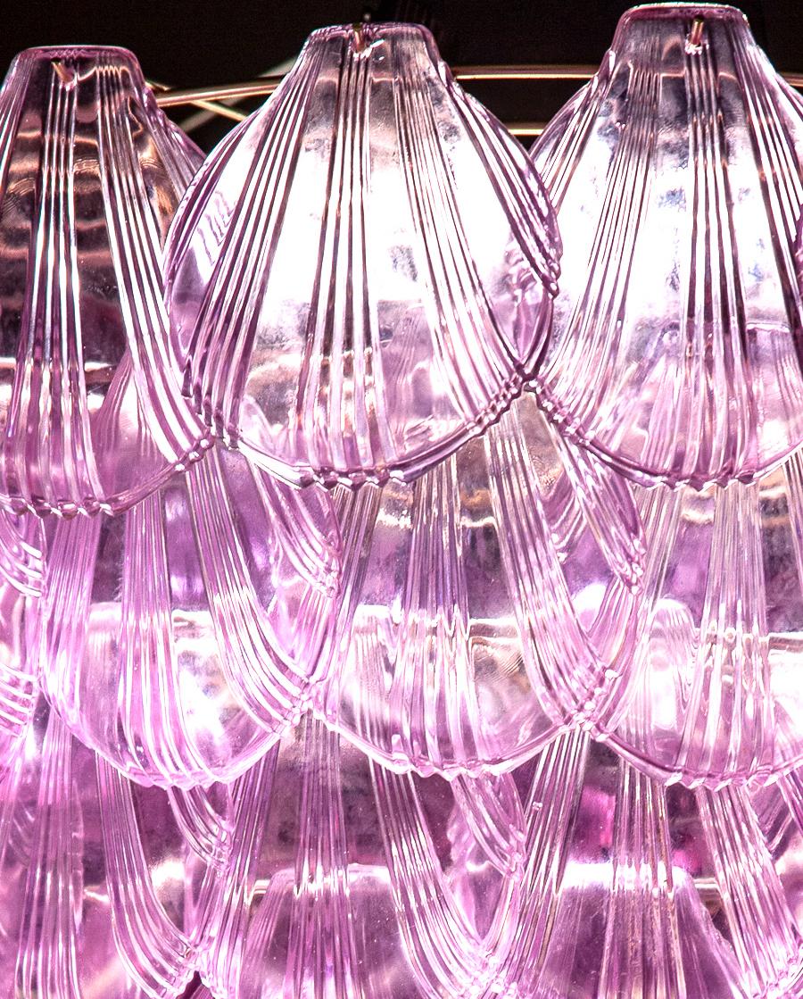 Fabulous three-tier Italian Murano glass chandelier with a Cascade of pink shells giving an extraordinary light effect.
  
 
