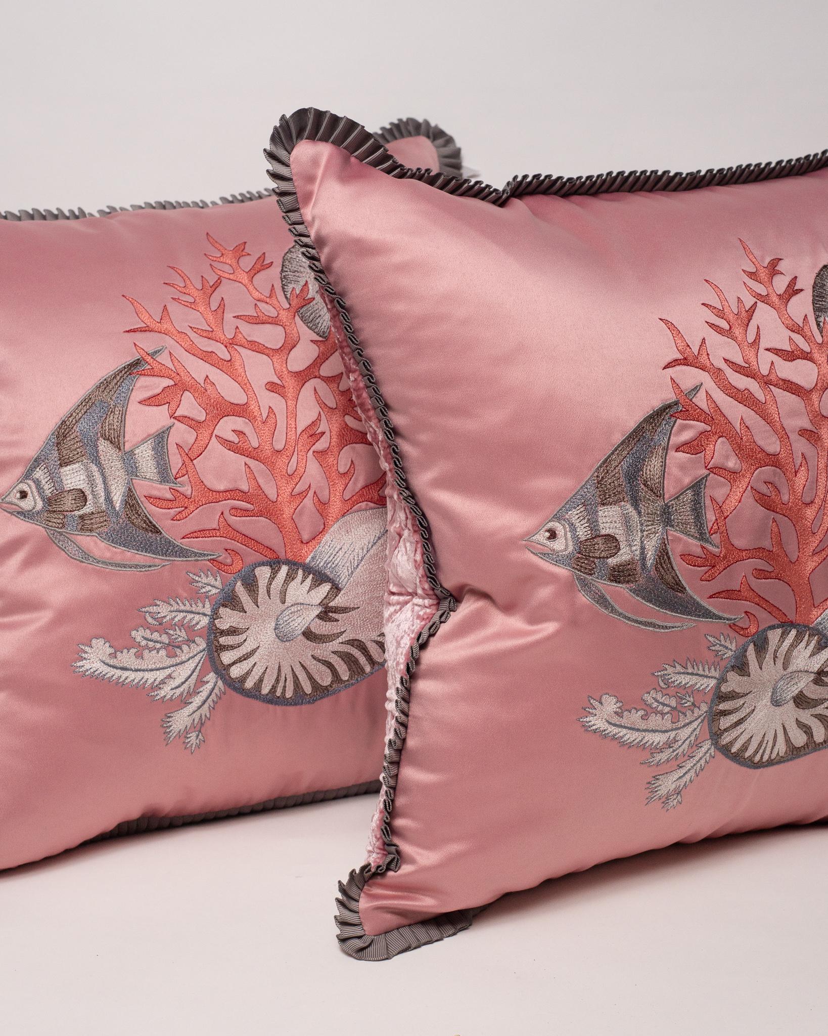 A beautiful pair of pink satin silk pillows with embroidered sea life motifs. Back in quilted velvet. Trimmed with grey grosgrain ribbon and entirely down filled.