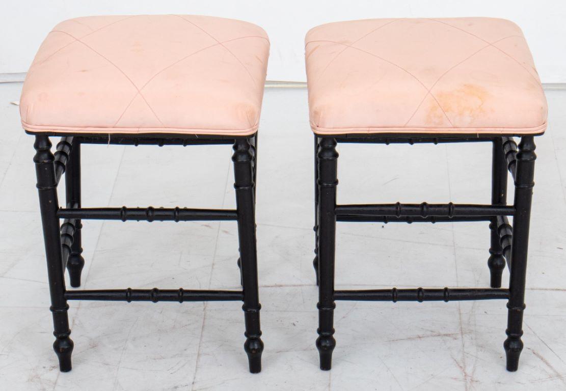Pair of pink suede footstools, each with square top above a turned fretwork base in the American Aesthetic taste.

Dealer: S138XX