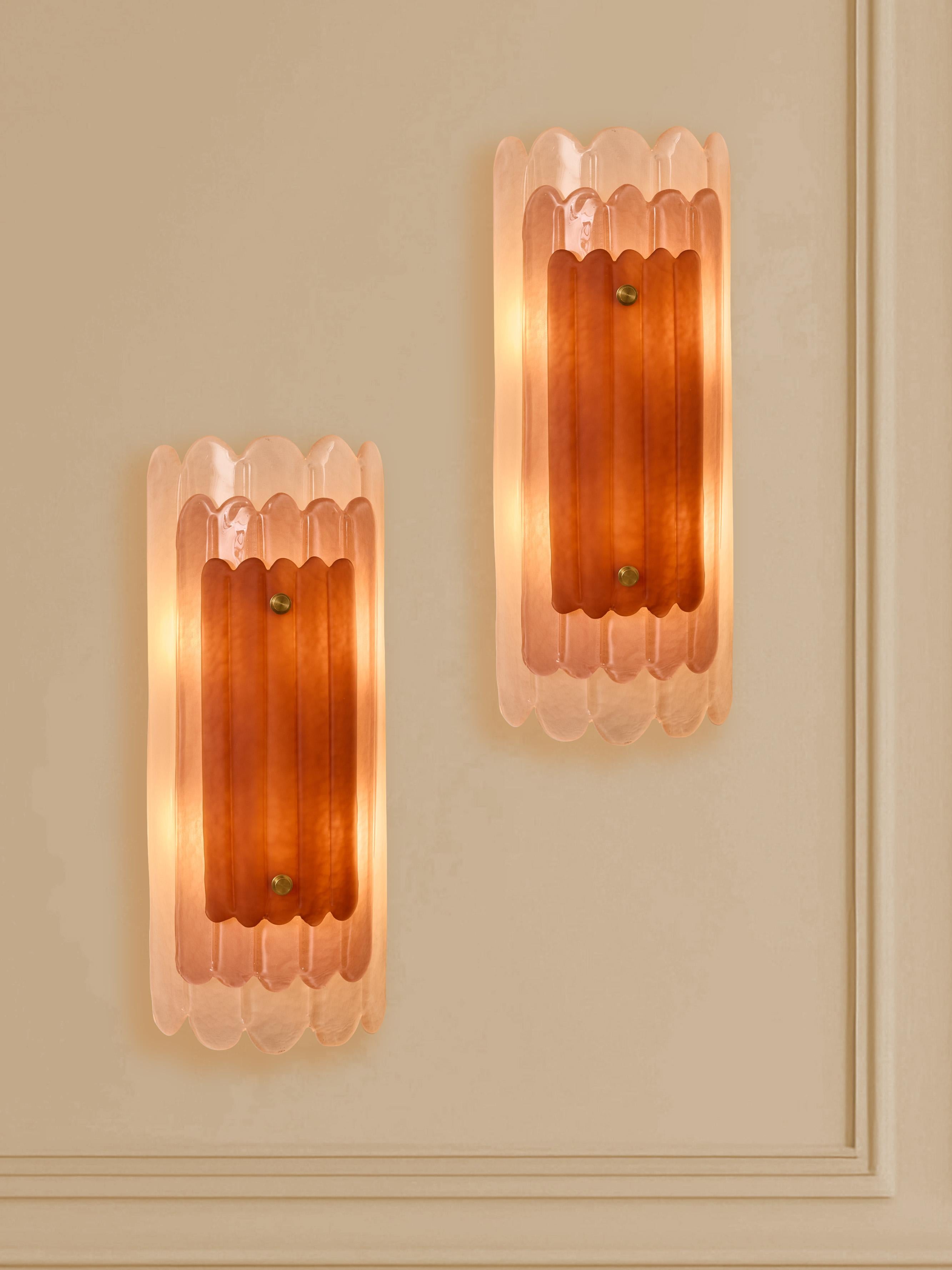 Pair of wall sconces in tinted Murano glass and brass by Studio Glustin.
Italy, 2024.