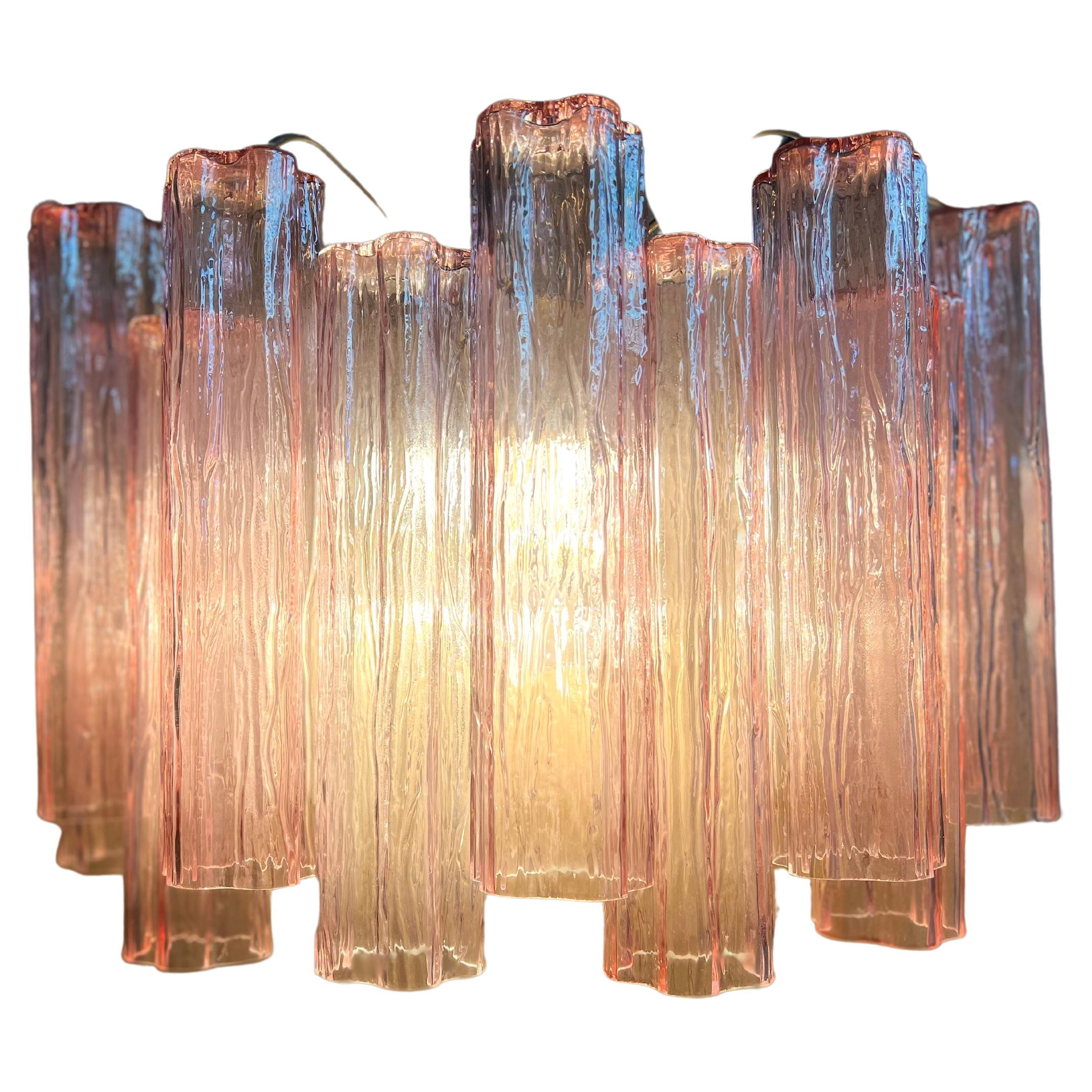 A very fine pair of sconces in the style Toni Zuccheri for Venini, 12 hand blown glass tubes on each sconce, each measuring 11.80” long.