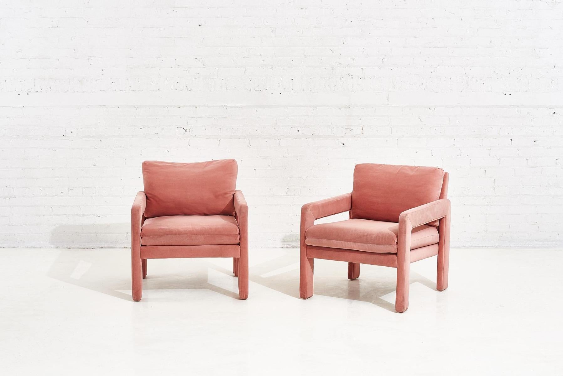 Pair of pink velvet post modern parsons lounge armchairs.