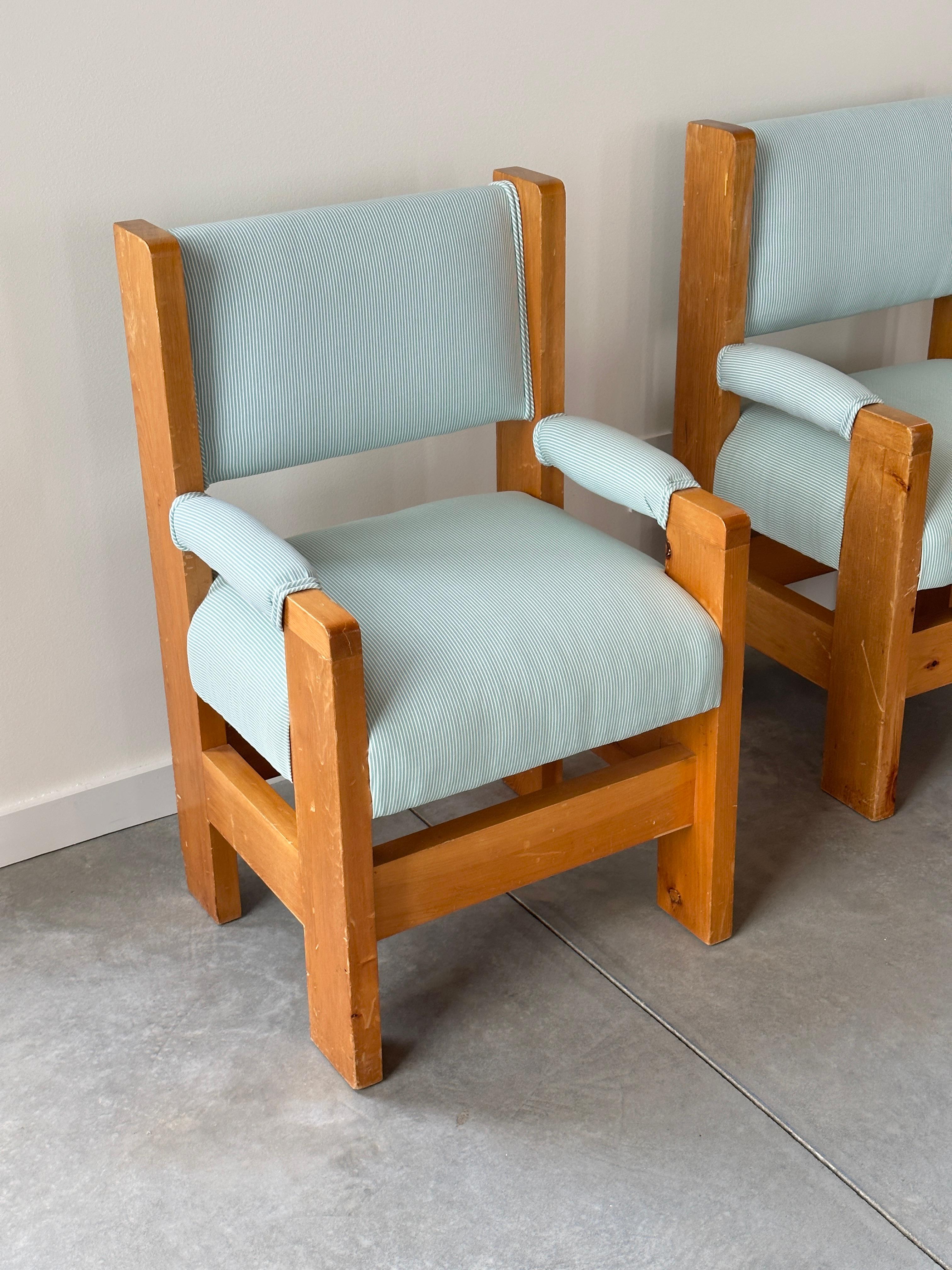 Mid-Century Modern Pair of pinstriped chunky pine captain chairs