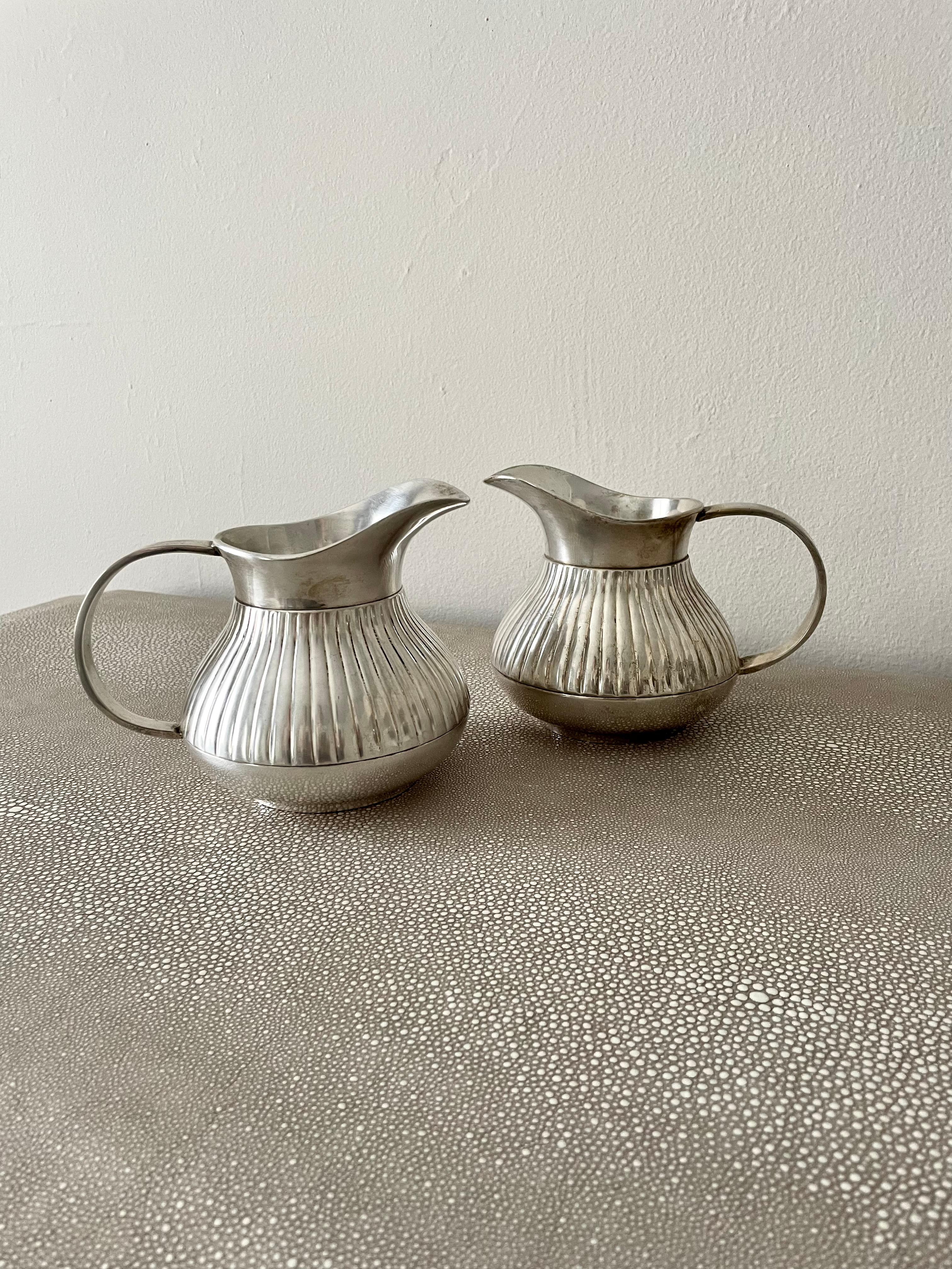 Pair of Pinstriped Silver Pitchers For Sale 1