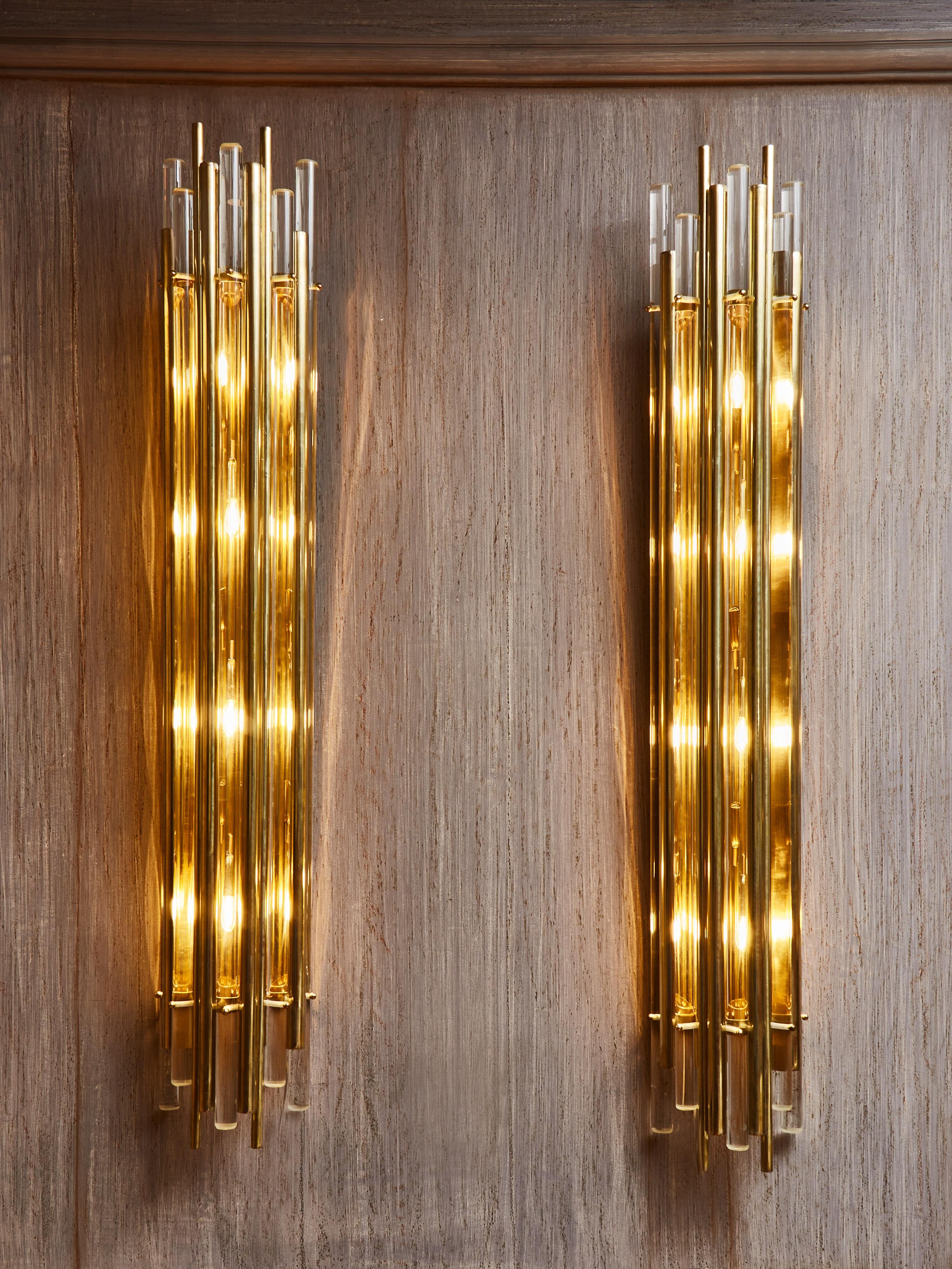 Elegant pair of wall light in brass and Murano glass.
Creation by Studio Glustin.
 