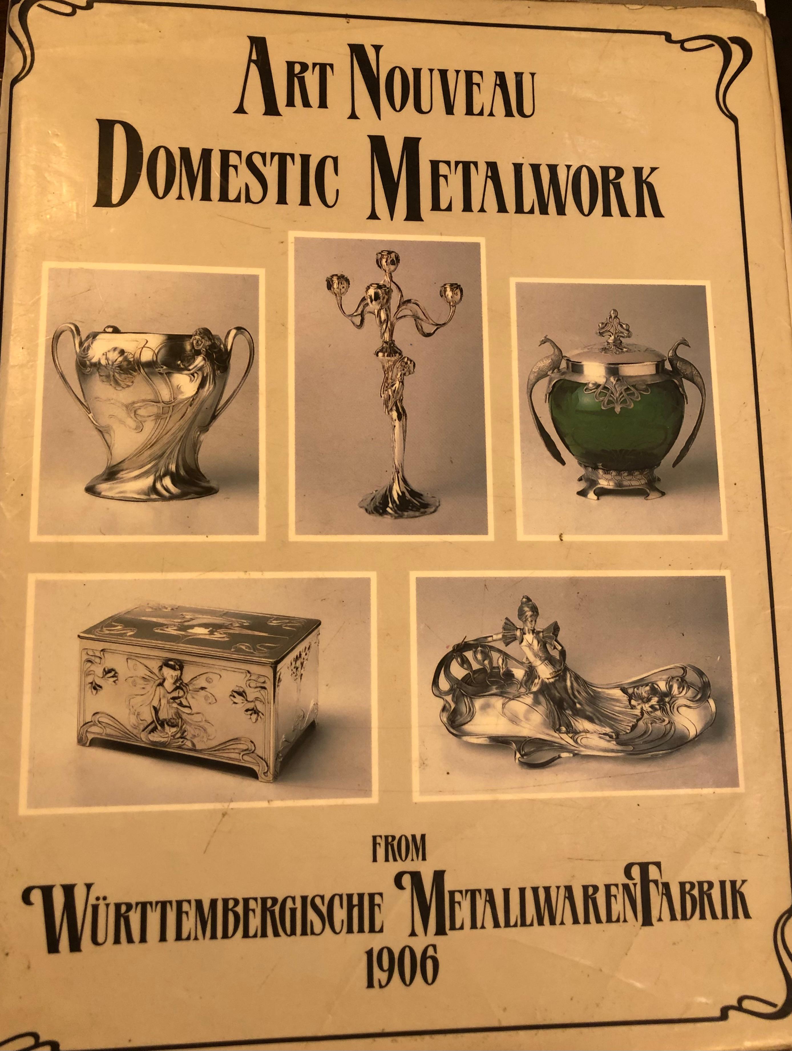 2 Pitchers WMF
Style: Jugendstil, Art Nouveau, Liberty
year: 1906
Country: Germany
Materials: silver plated and glass 
Several of the WMF objects can be seen in museums
Stamps
Page 134 = of the book Art Nouveau Metalwork from Wurttembergische