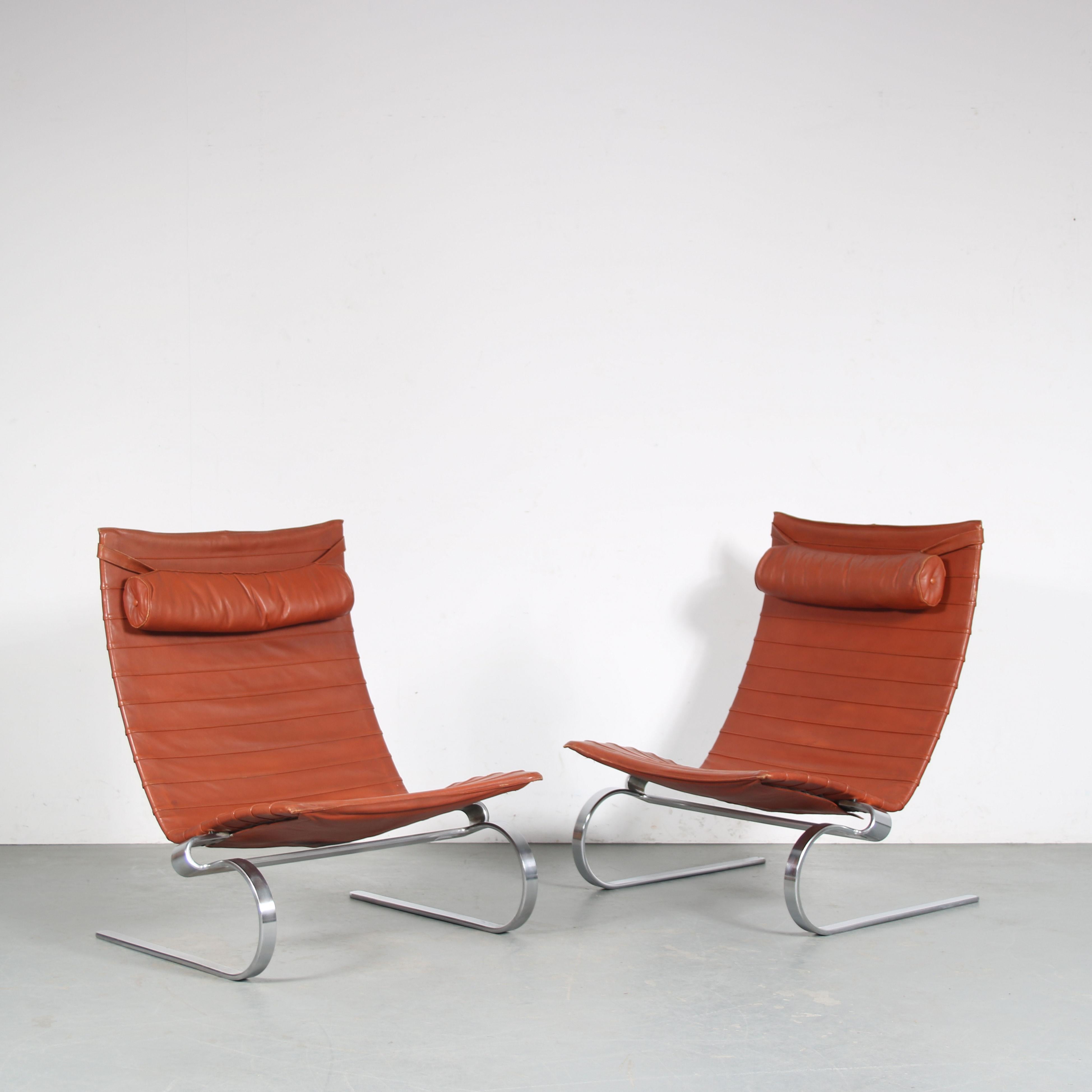 A beautiful pair of PK20 highback lounge chairs, designed by Poul Kjaerholm and manufactured by E. Kold Christensen in Denmark around 1960.

This very rare set is guaranteed to draw the attention of any design enthusiast! Each chairs has a
