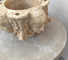 Pair of Planters with Four Candle Holes and Faces on Each Side