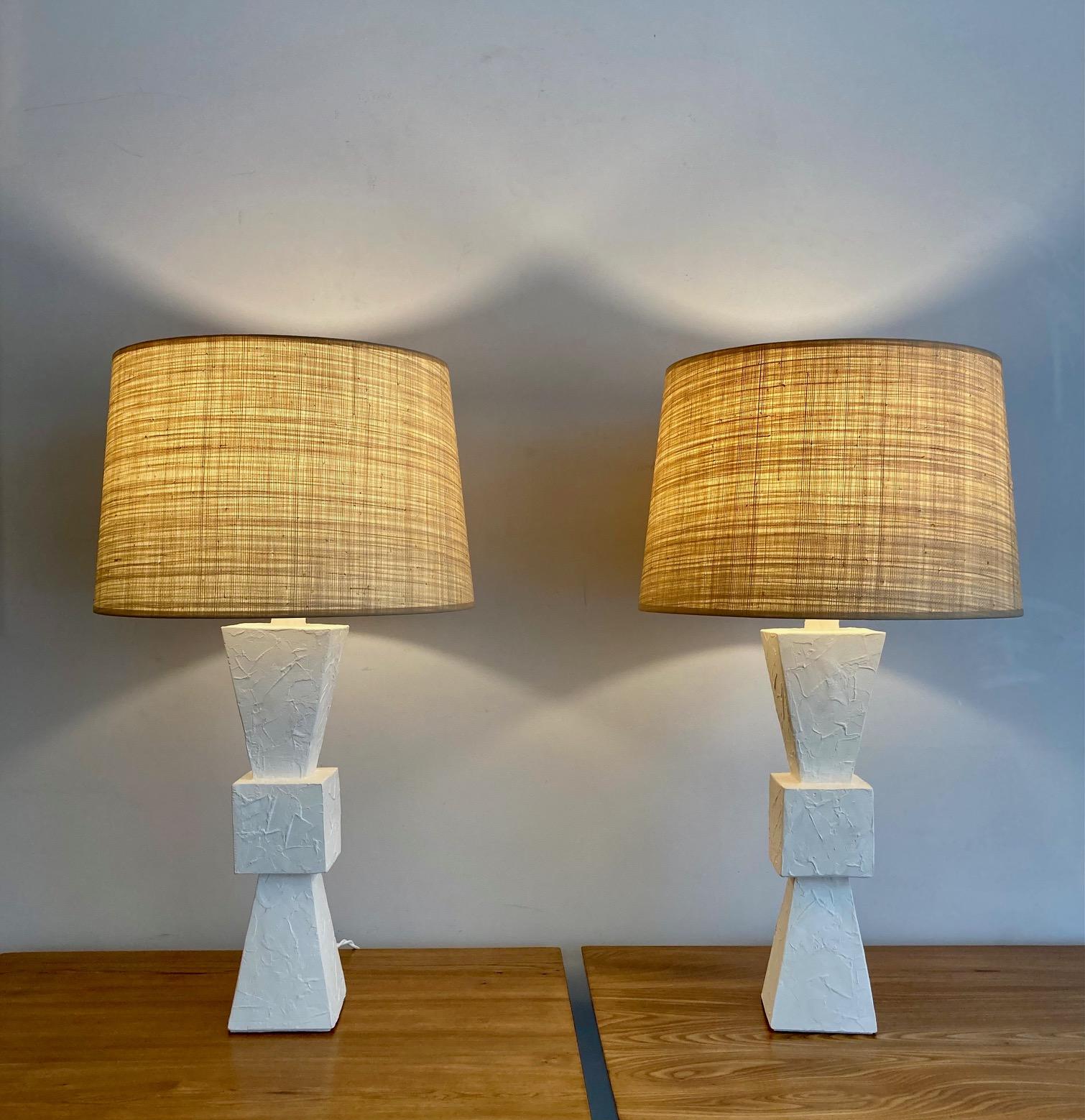 Pair of plaster lamps, baluster shape.
With custom made shades in vegetal fiber.
France, contemporary creation

Measures: Total height 81 cm - 31.9 inches
Plaster base height (including collar) 52 cm - 20.5 inches
Diameter (shade) 47 cm - 18.5