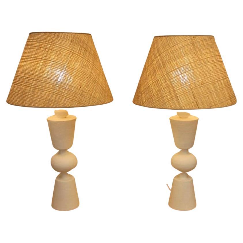 Paire de lampes en plâtre, à la manière de Jean Michel Franck en vente
