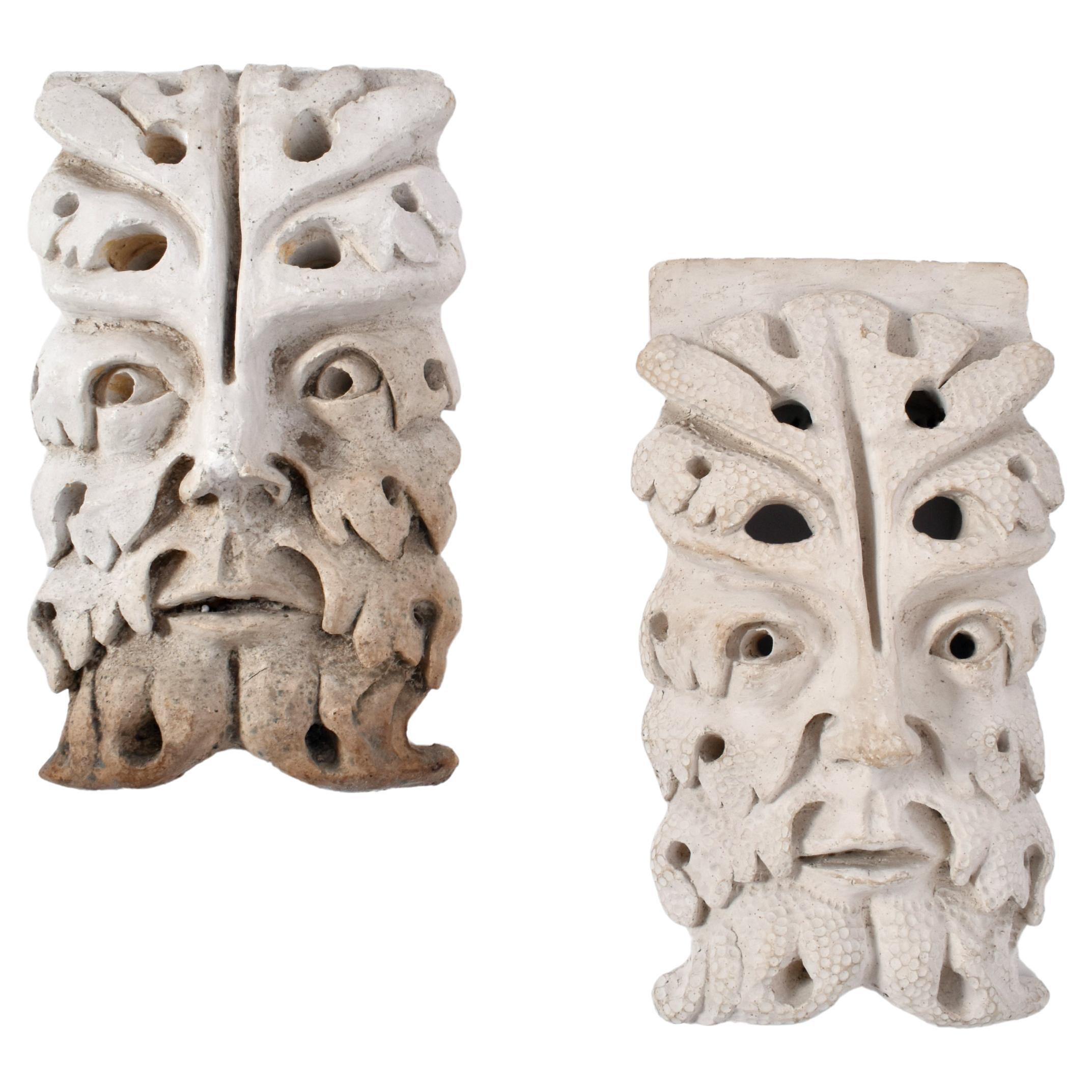 Pair of plaster mascaron sconces, 1940s