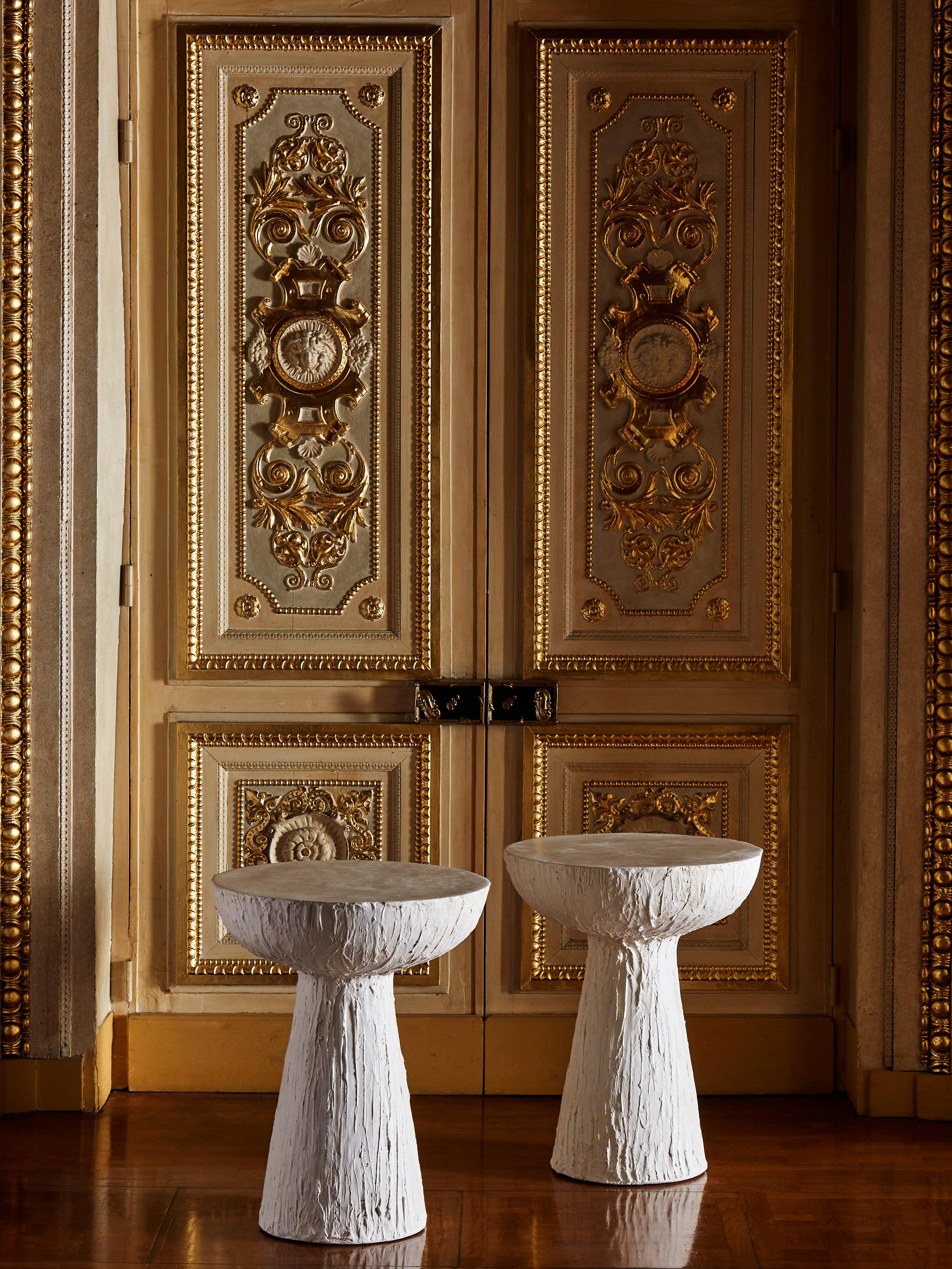 Elegant pair of pedestals in sculpted plaster.
 
