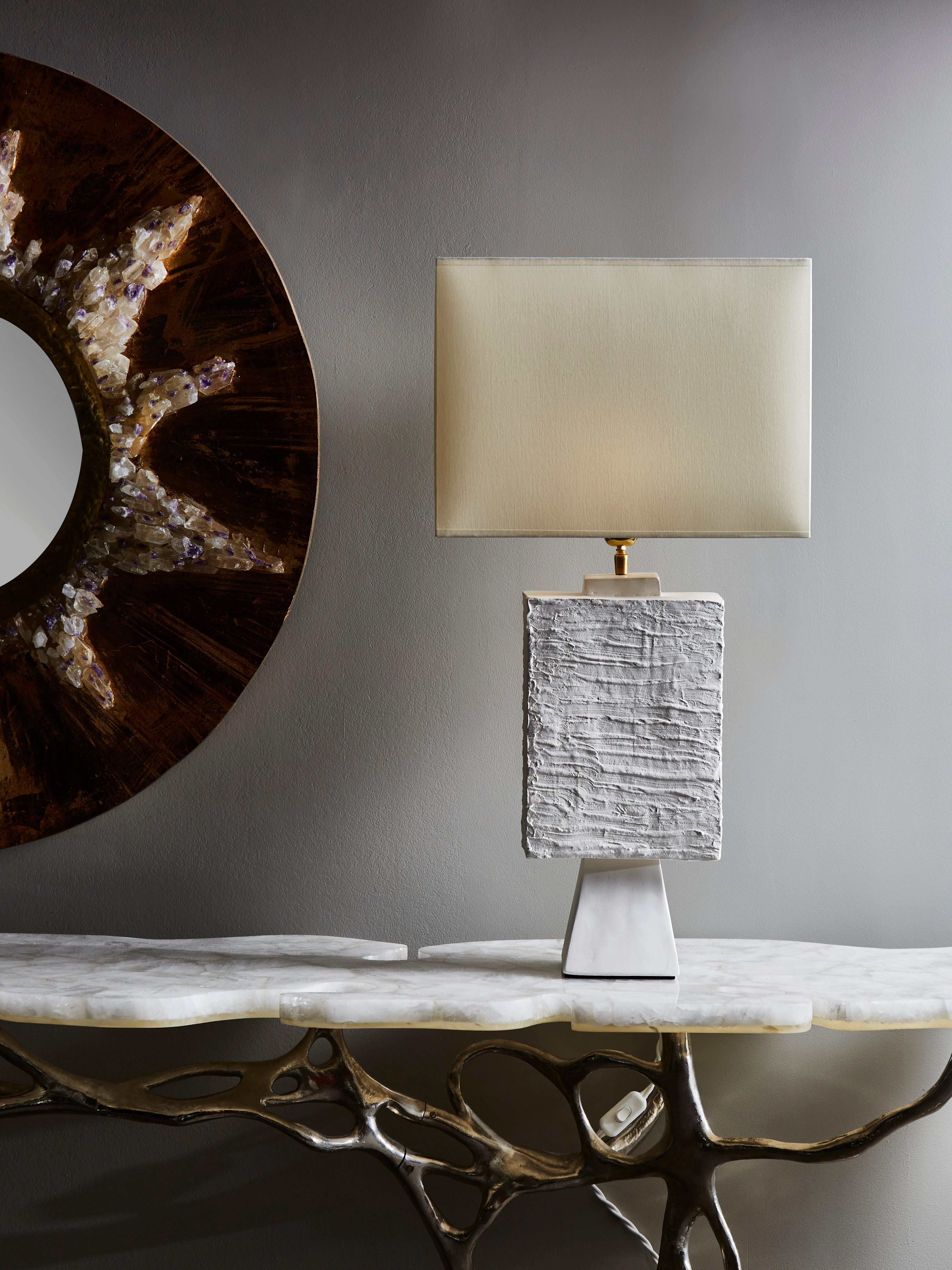 Pair of rectangle table lamps made of textured plaster and brass settings.

Contemporary work made in France.