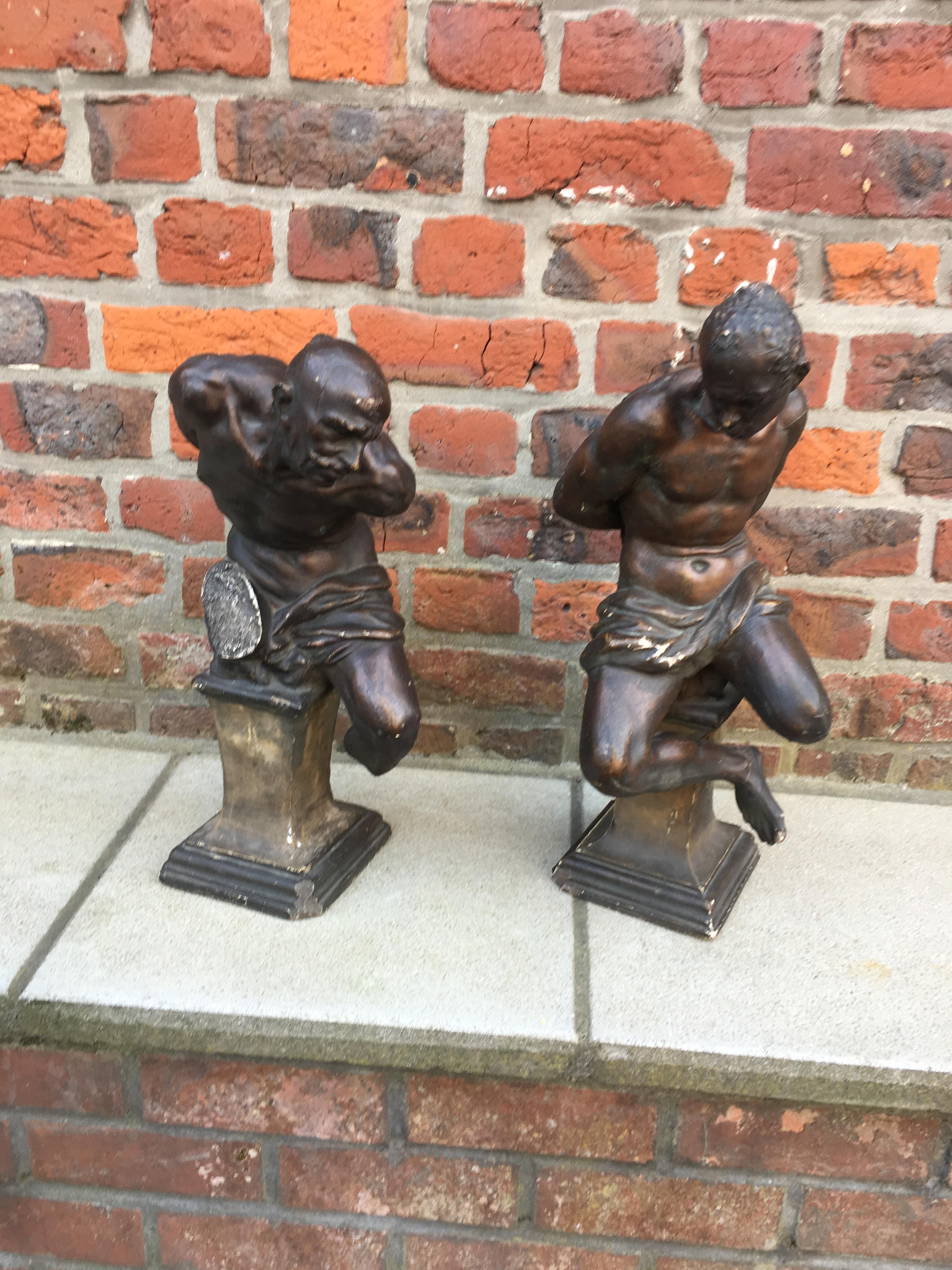 European Pair of Plaster Slaves with Bronze Patina, Many Losses and Flaws For Sale