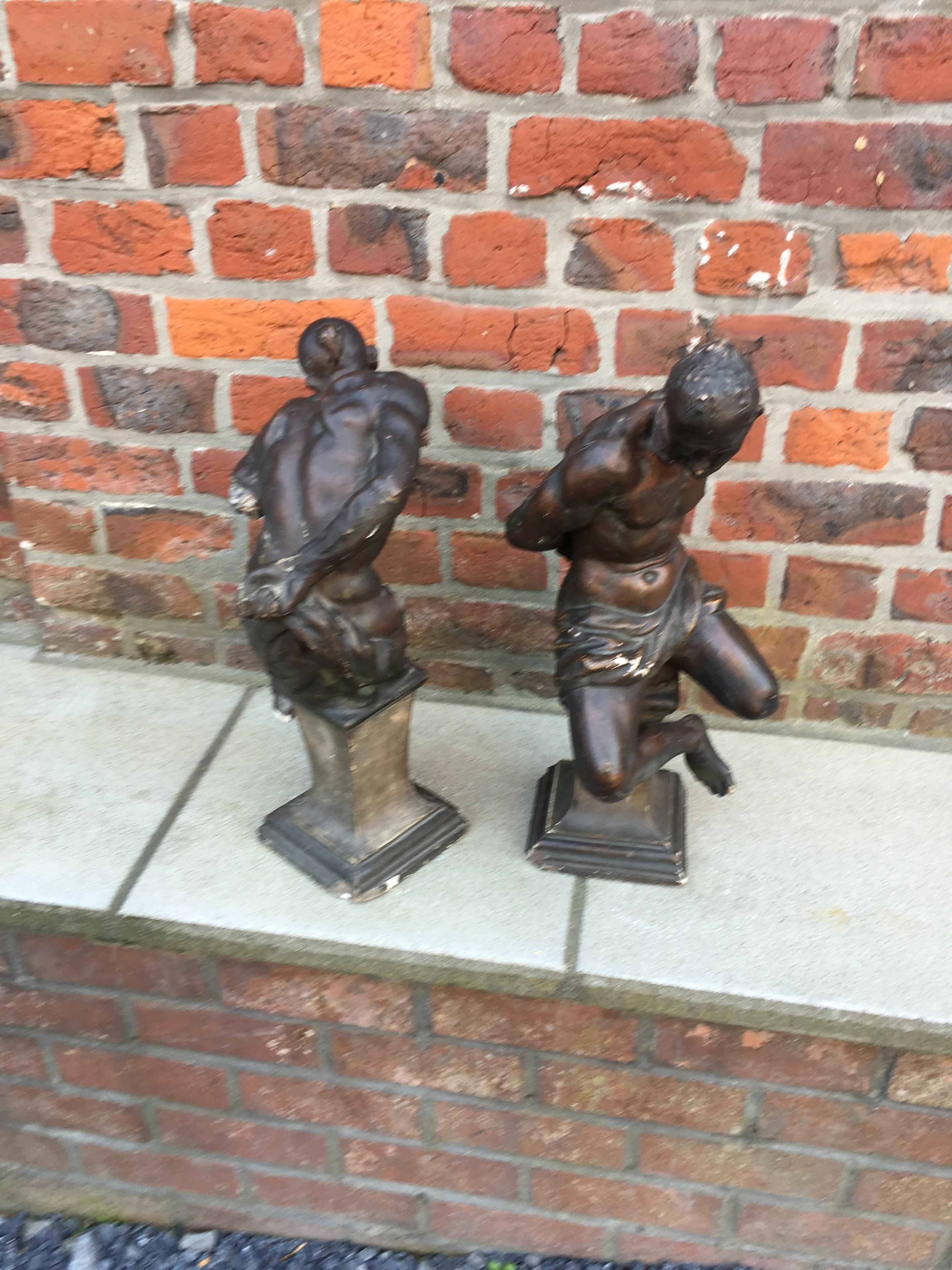 Pair of Plaster Slaves with Bronze Patina, Many Losses and Flaws In Distressed Condition For Sale In Saint-Ouen, FR