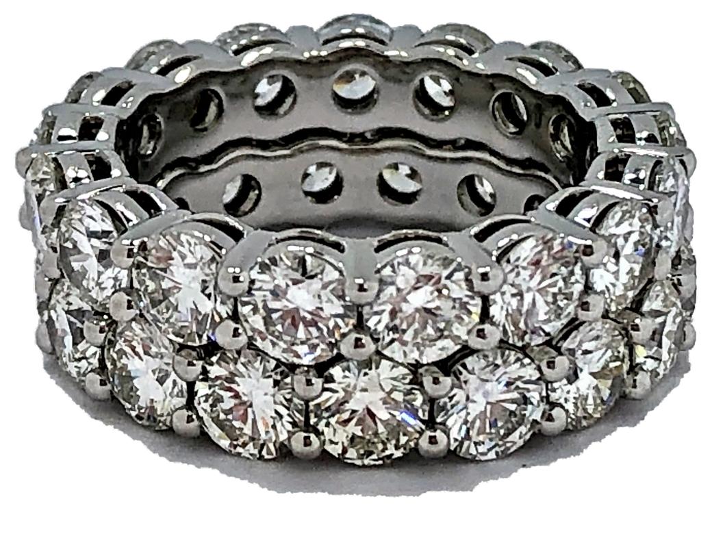 A great looking, brilliant pair of platinum eternity bands. The 34 round brilliant cut diamonds are common prong set and weigh a total of 8.70Ct of overall F/G Color and VS1-VS2 Clarity.  (They average .26ct  each). The beauty of this set, aside